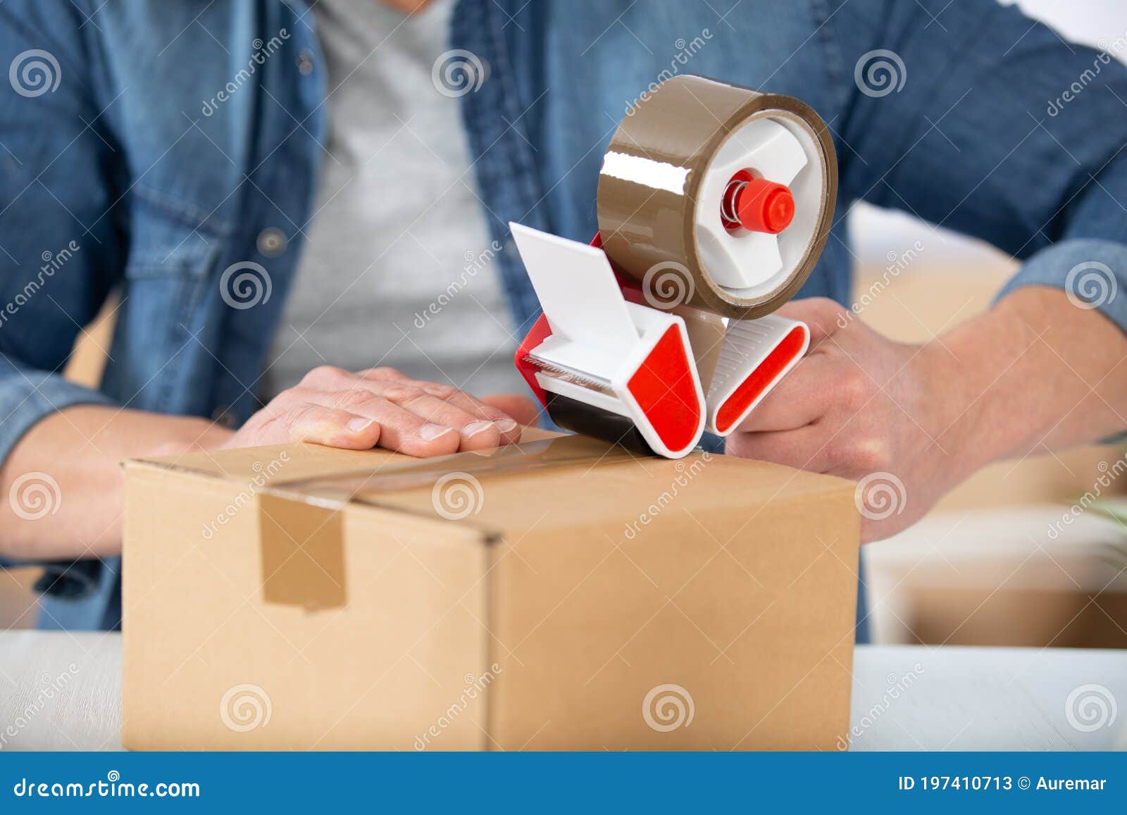 Man Applying Adhesive Tape on Packing Box Stock Image Image of change, apply 197410713