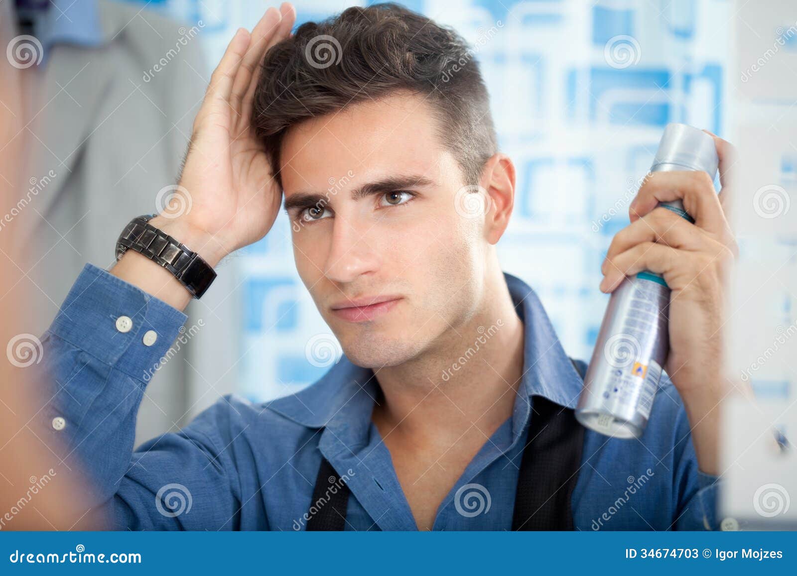 Man Applying Hair Spray Stock Photos - Image: 34674703