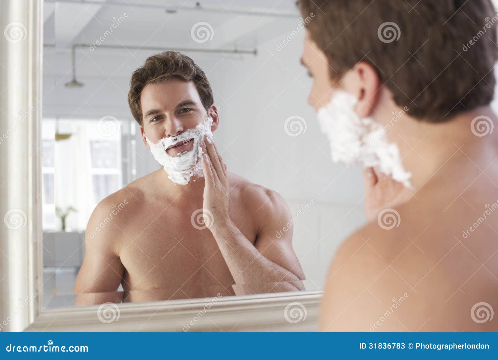 Man Applying Shaving Cream stock image. Image of indoors 31836783