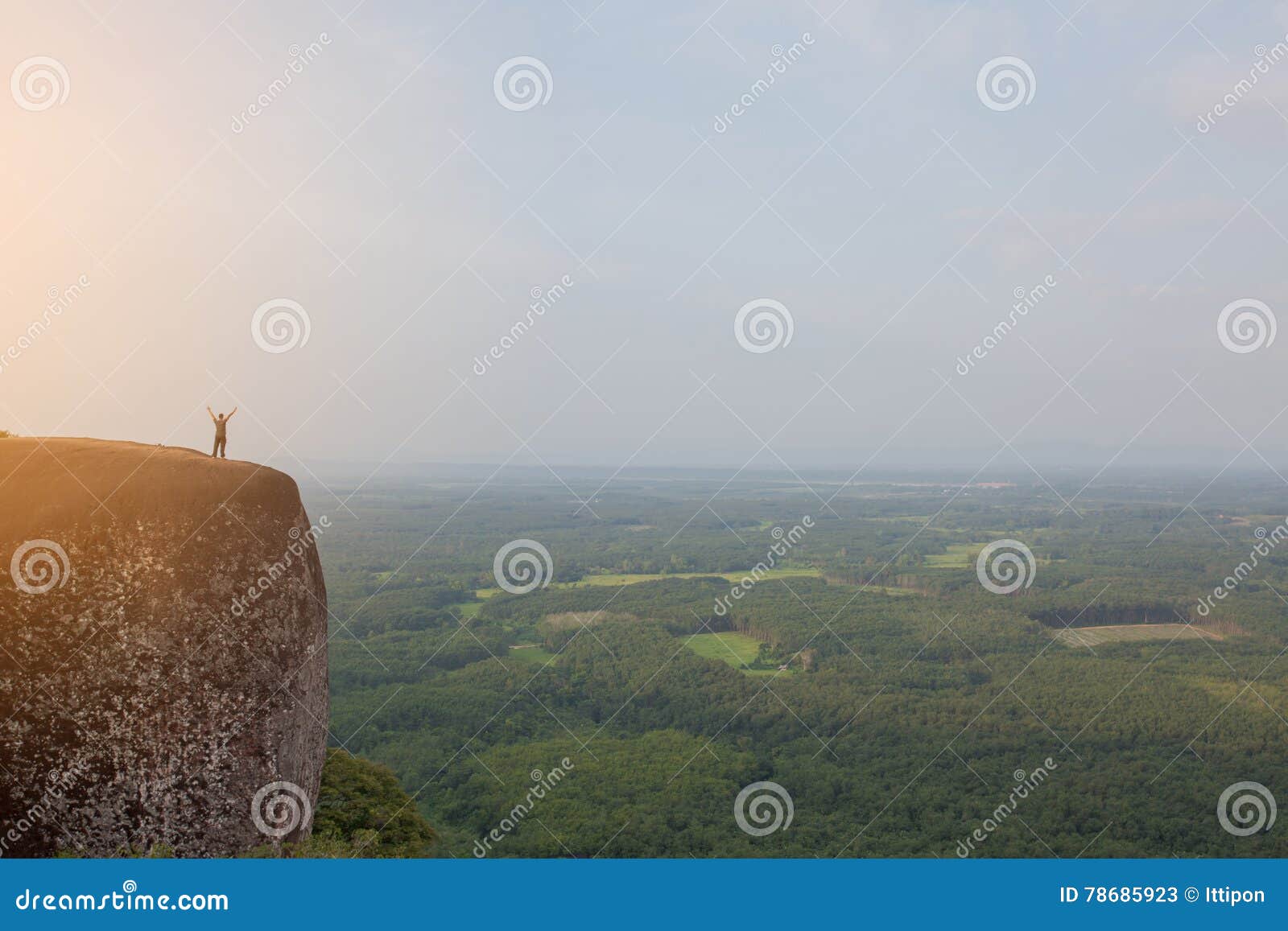Man with arms outstretched stock image. Image of mountain 78685923