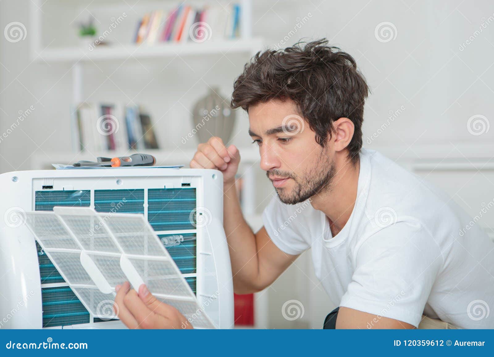 Man Assembling Air Conditioning Unit Stock Photo Image of confused