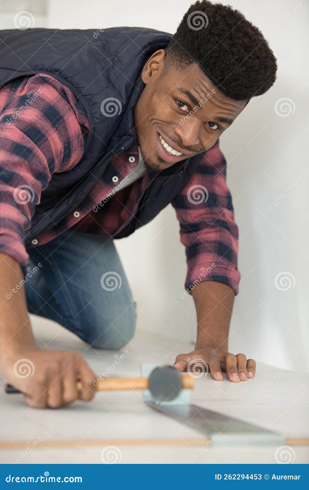 Man assembling flooring stock image. Image of residential 262294453