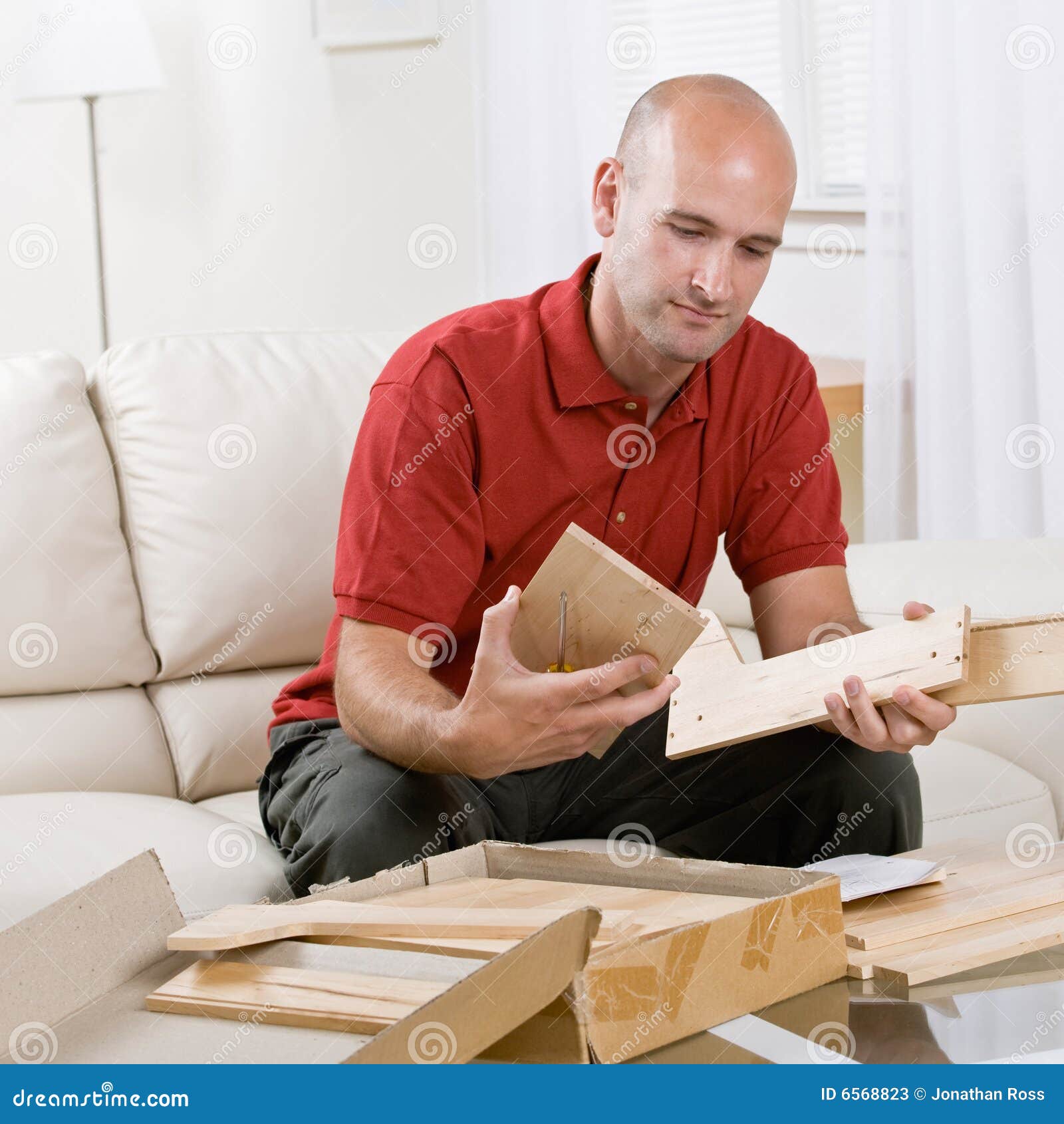 Man Assembling Wooden Shelving Parts Stock Image Image of person