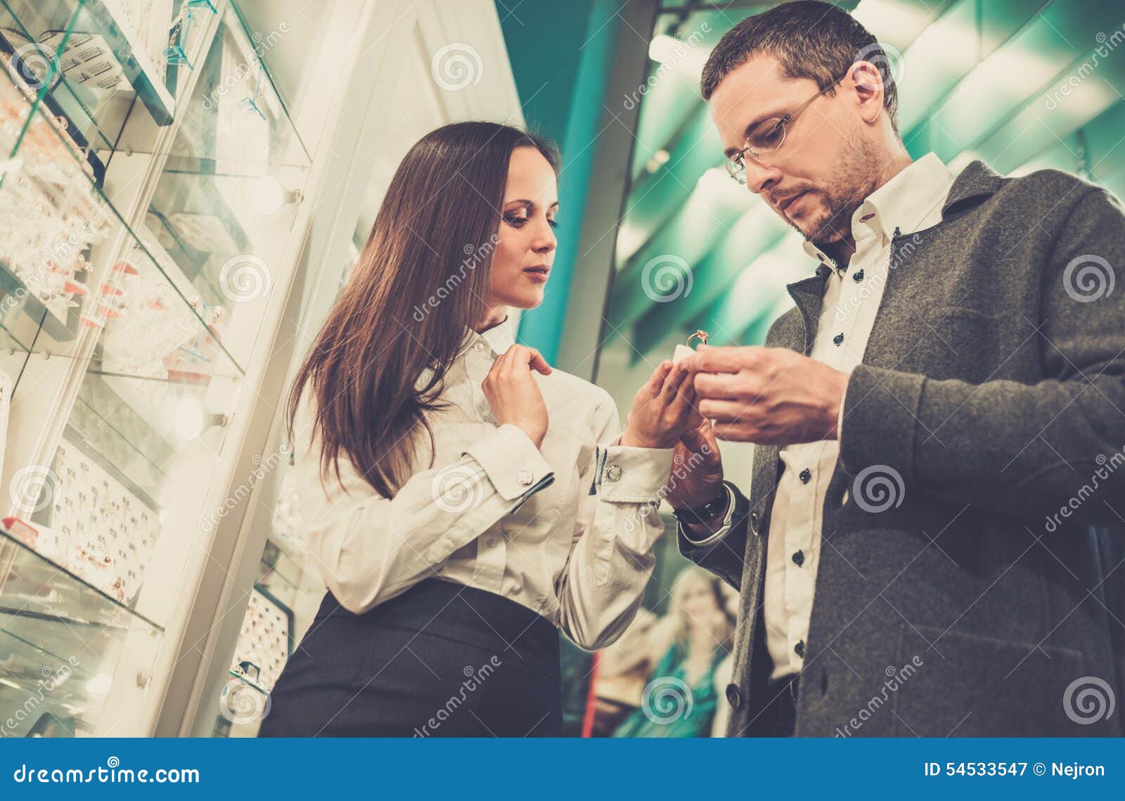 Man with Assistant in Jewellery Shop Stock Image Image of display