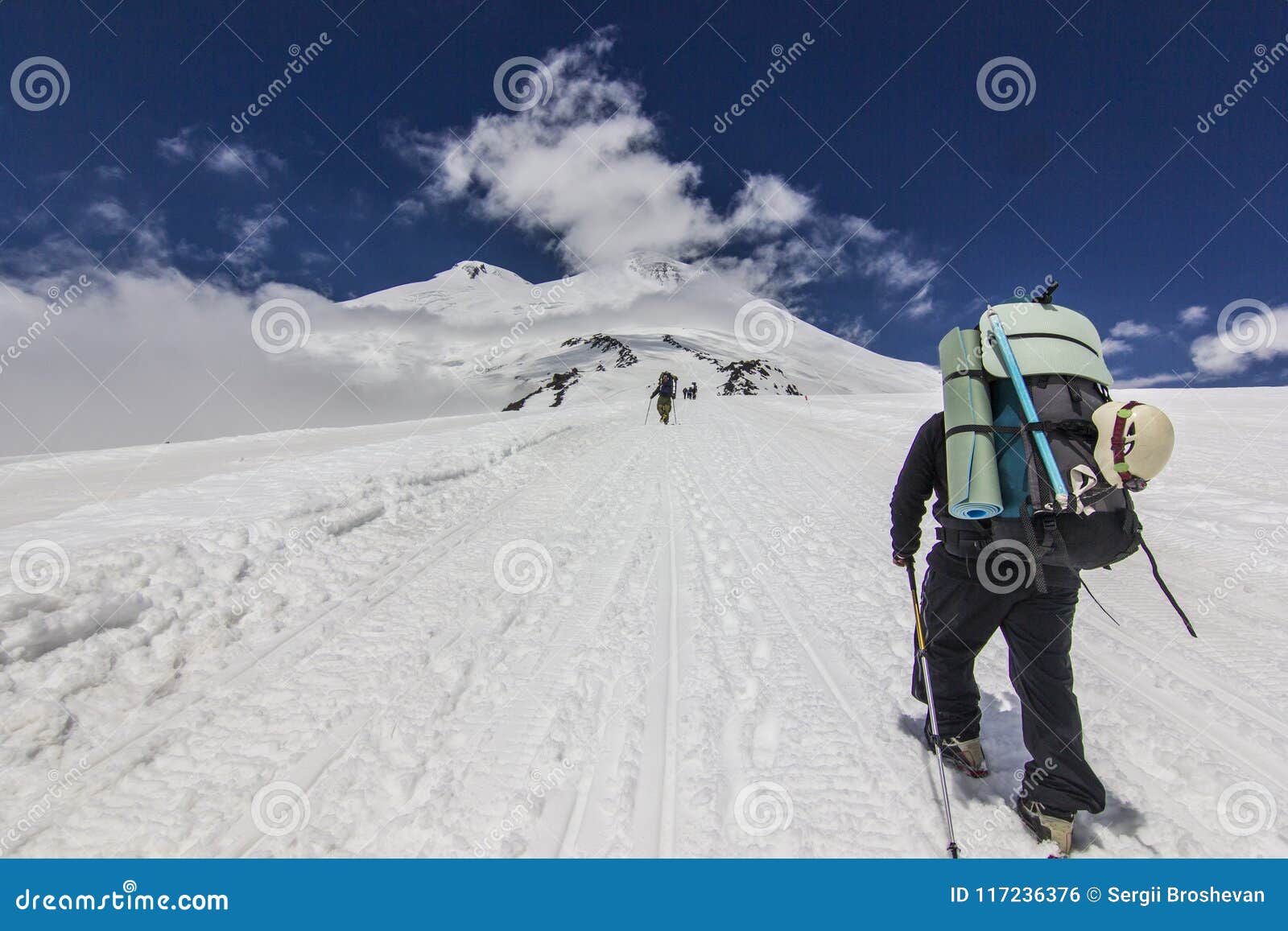 Man with Backpack Climbing on Elbrus in Snowy Caucasus Mountains Stock ...