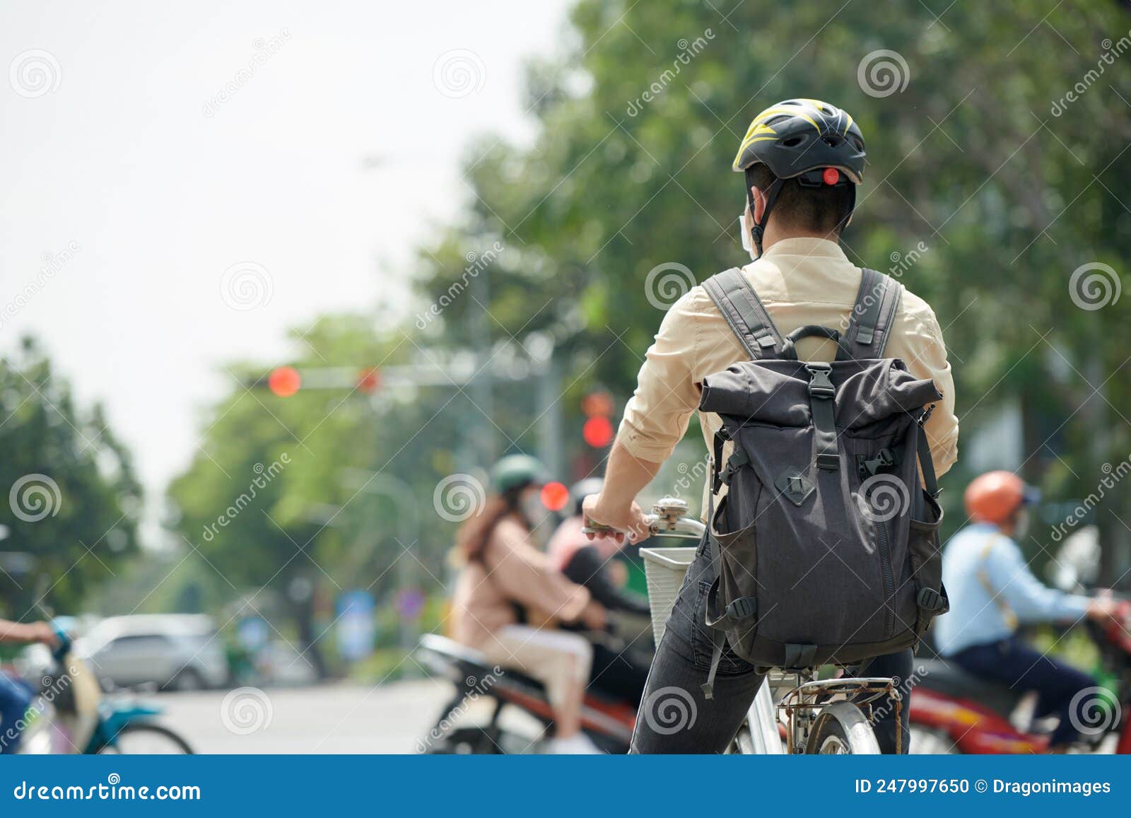 Man with Backpack Riding Bicycle Stock Photo Image of back, bicycle 247997650