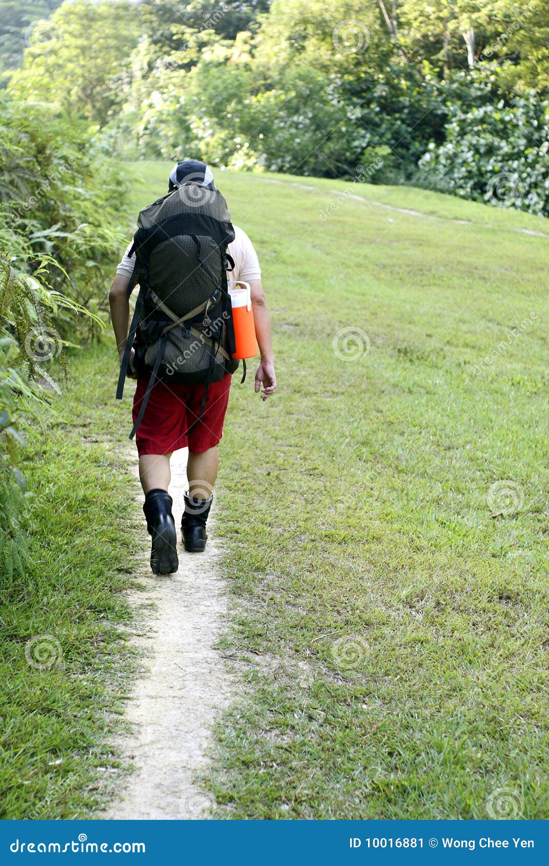 man backpacking outdoors