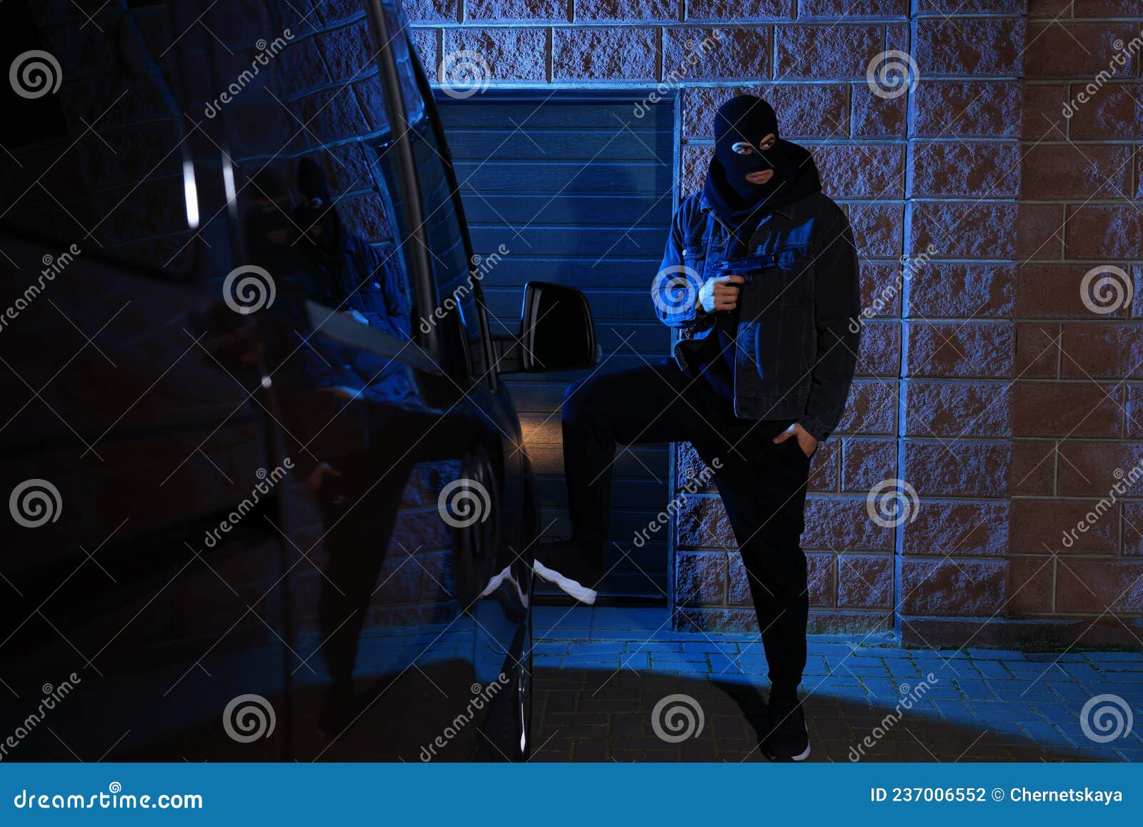 Man in Balaclava with Gun Near Van Outdoors Stock Photo Image of