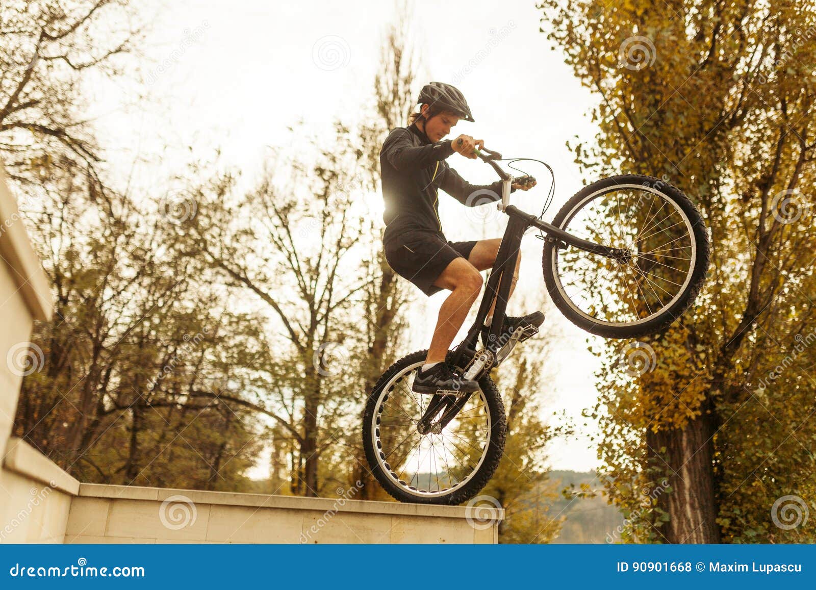 Man Balancing on a Bicycle in Park Stock Photo - Image of outdoors ...