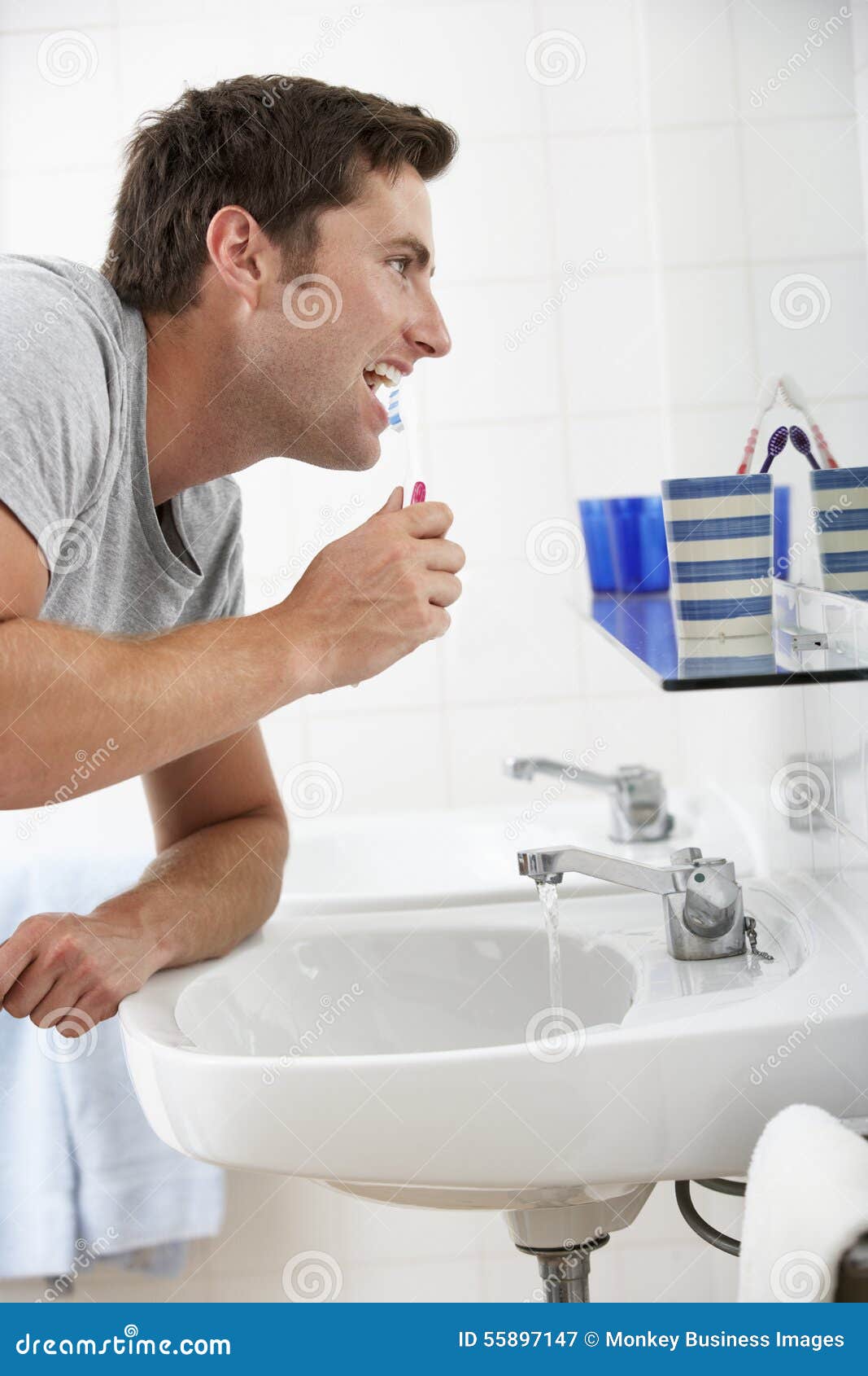 Man in Bathroom Brushing Teeth Stock Image Image of mirror, mouth