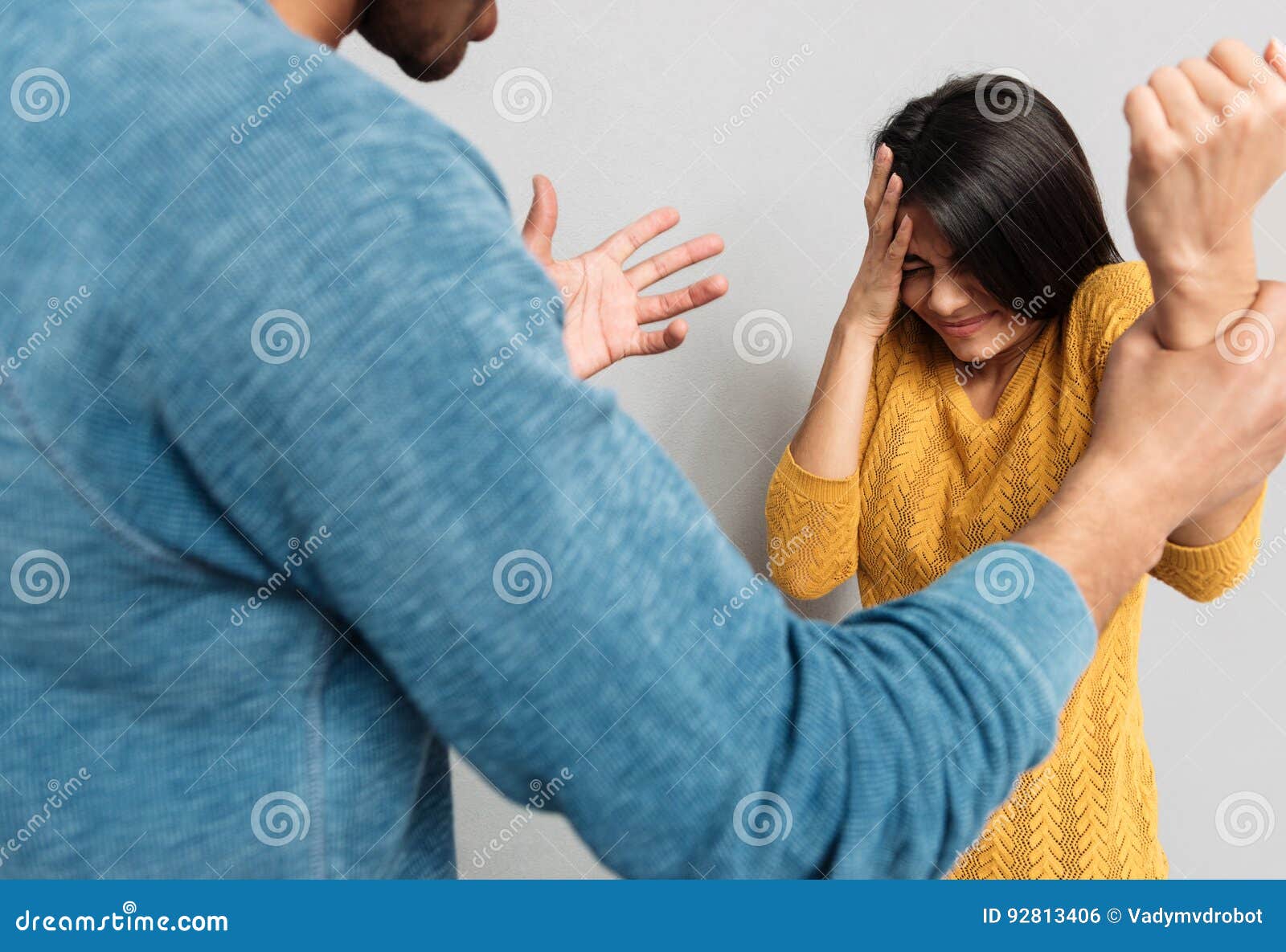 Man beating up wife stock photo. Image of 92813406