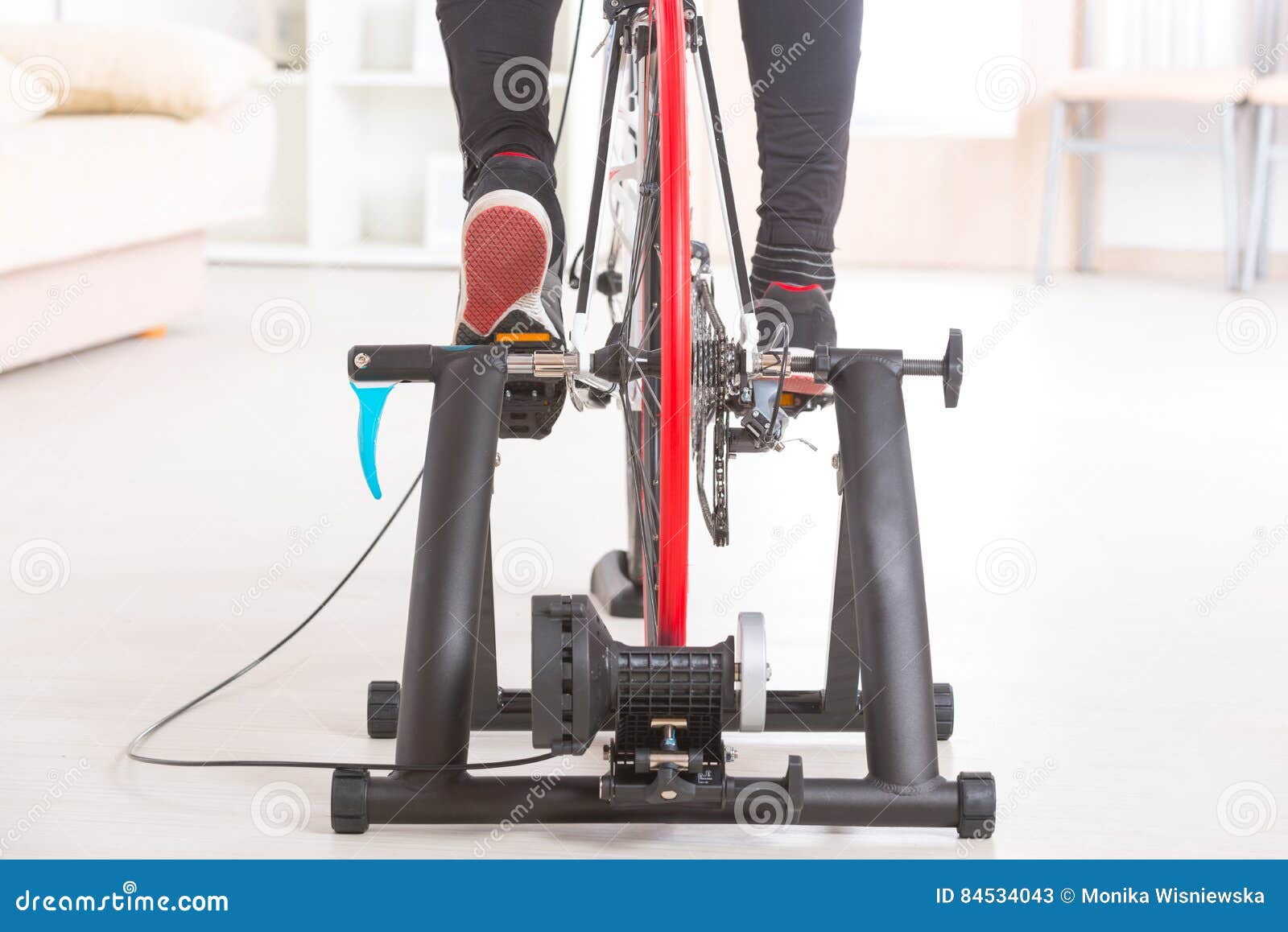 Man on bicycle trainer stock image. Image of machine 84534043