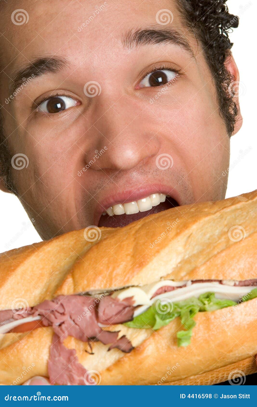 Man Biting Sandwich stock photo. Image of meat, sandwich 4416598