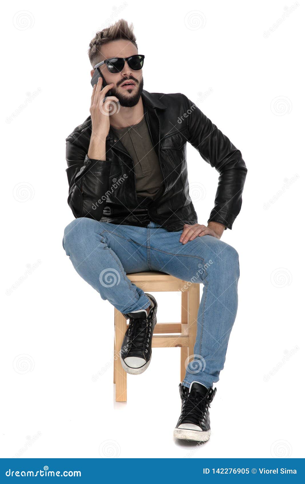 Man Sitting on Chair Talking on the Phone Being Surprised Stock Image ...
