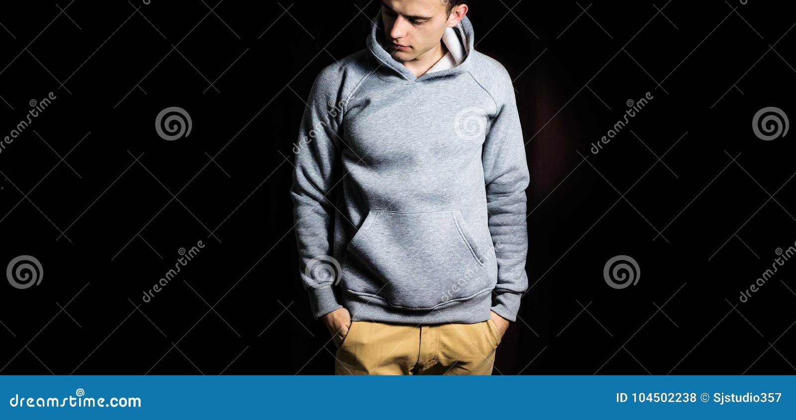 Download Man In The Blank Grey Hoodie, Sweatshirt On A Black ...