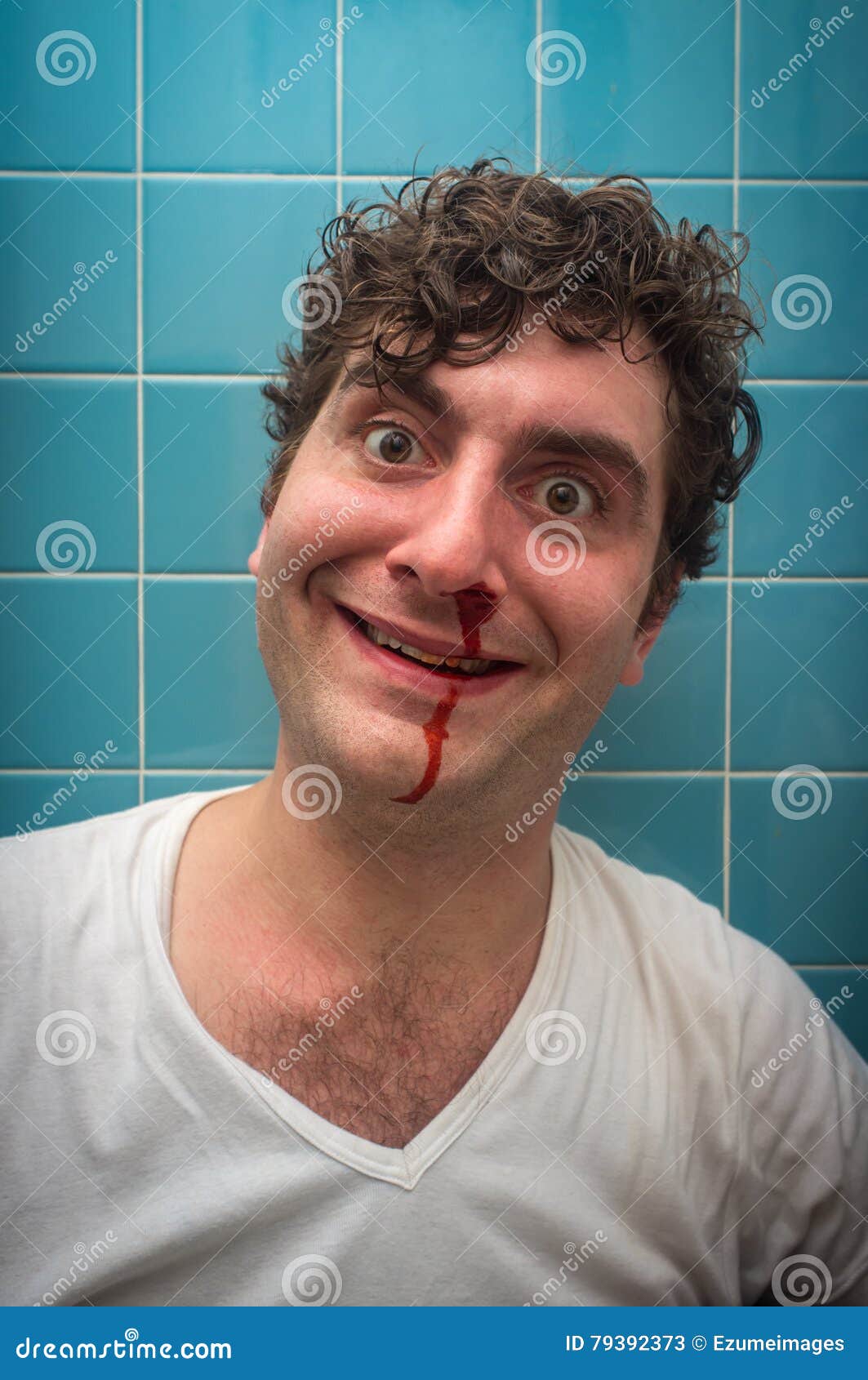 man-bloody-nose-curly-haired-bathroom-bad-bleed-79392373.jpg