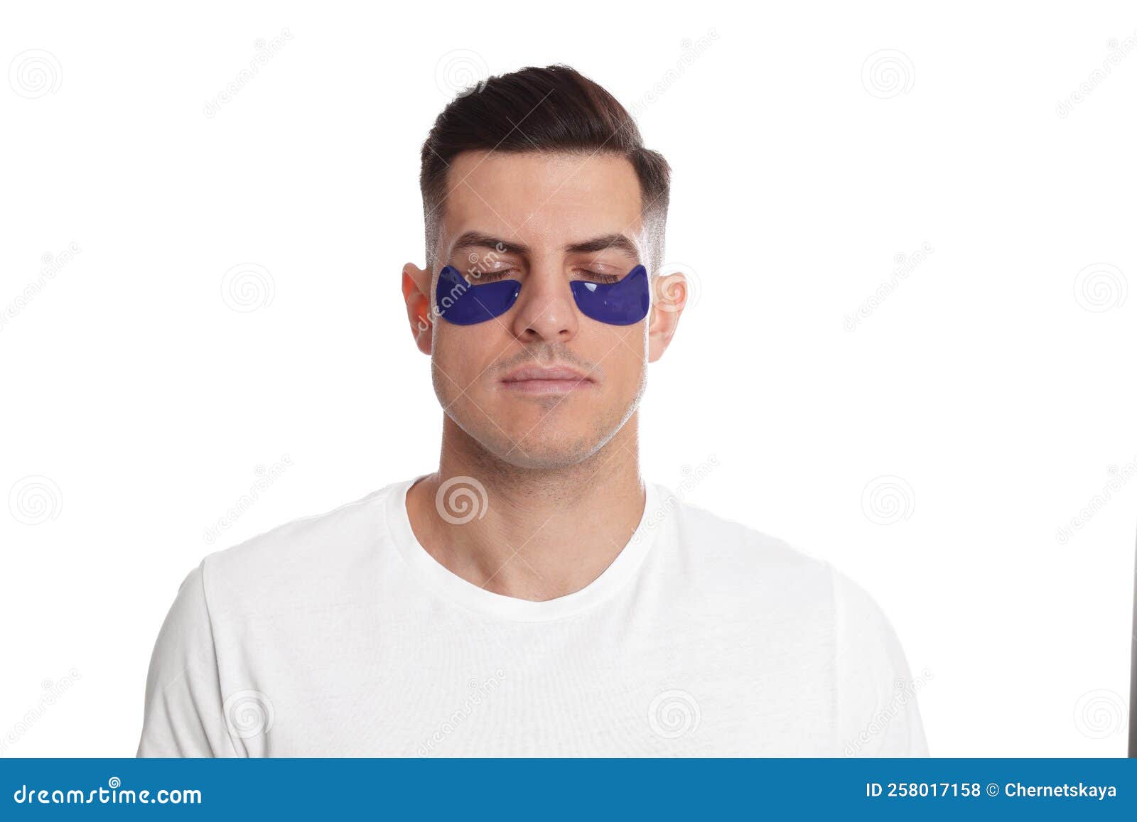 Man with Blue Under Eye Patches on White Background Stock Photo - Image ...