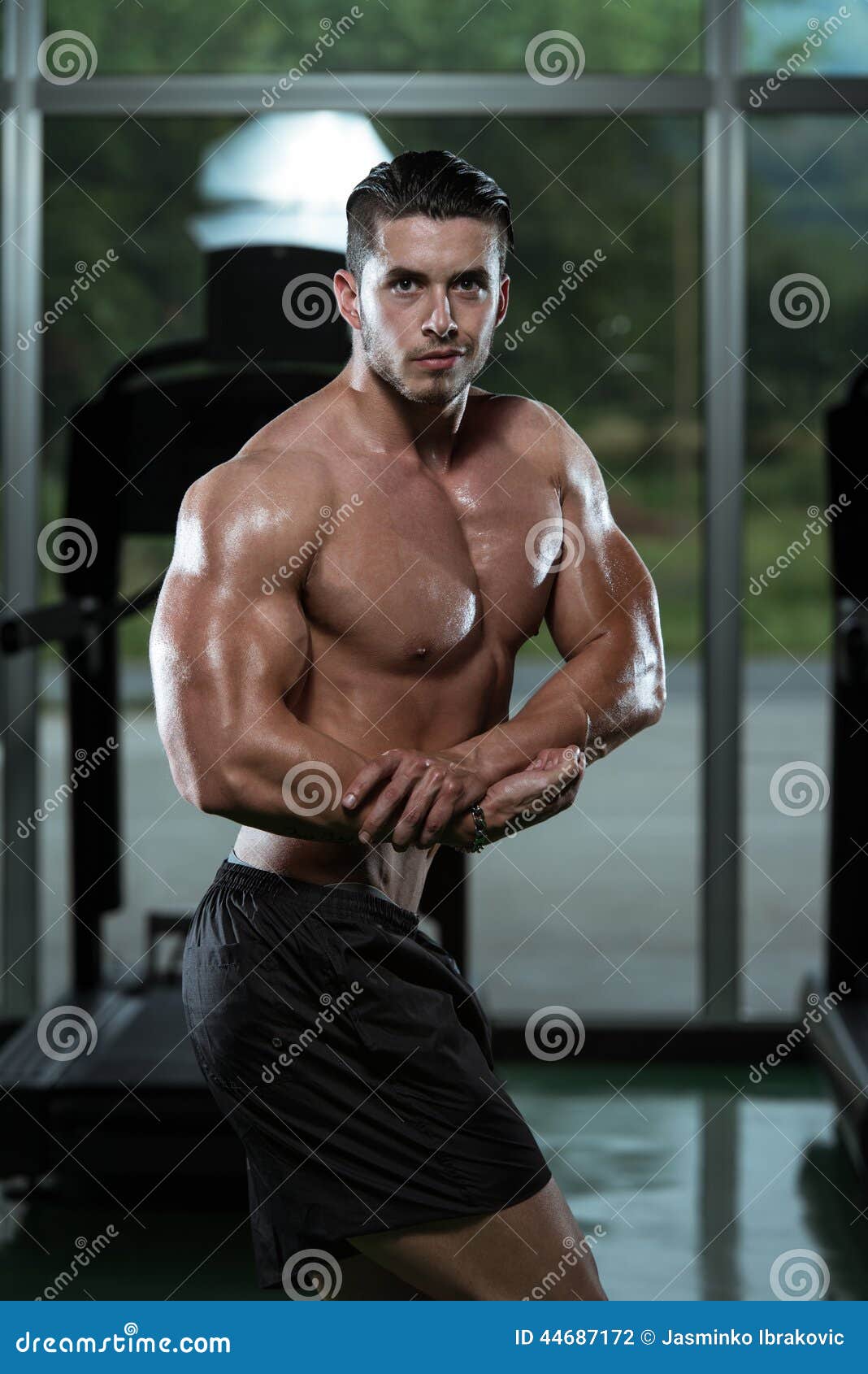 Man Bodybuilder Performing Side Chest Pose Stock Photo - Image of