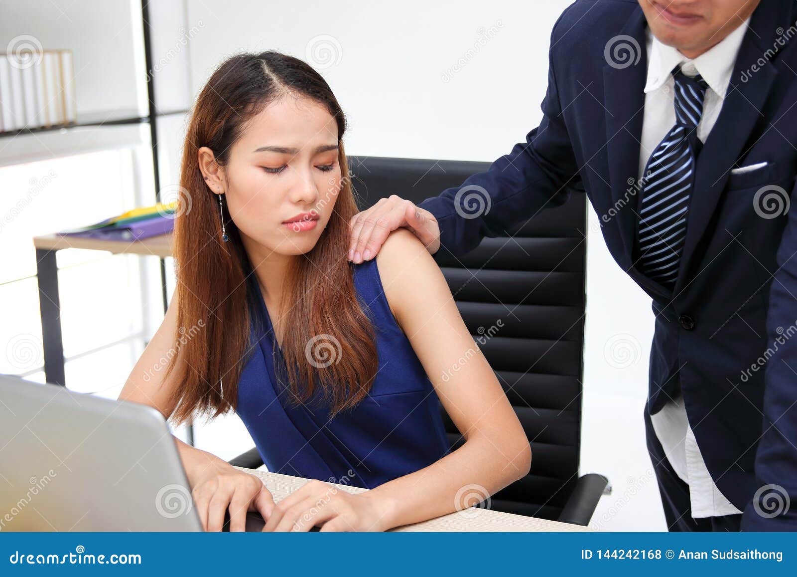 Man Boss Touching Woman Knee In Workplace Of Office Sexual Harassment In Office Royalty Free