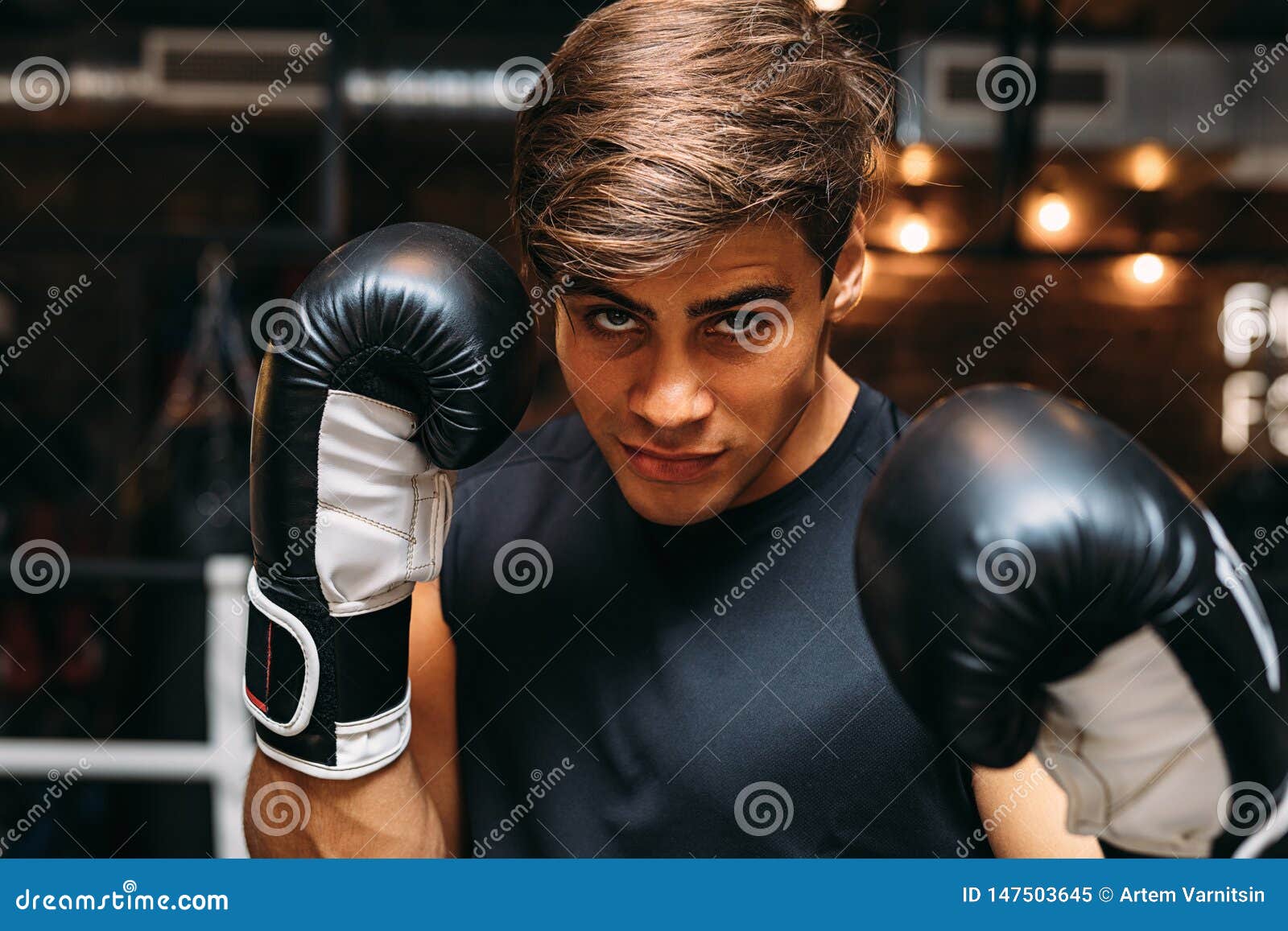 Man Boxer in Ring Wearing Boxing Gloves Stock Image Image of gloves, strength 147503645