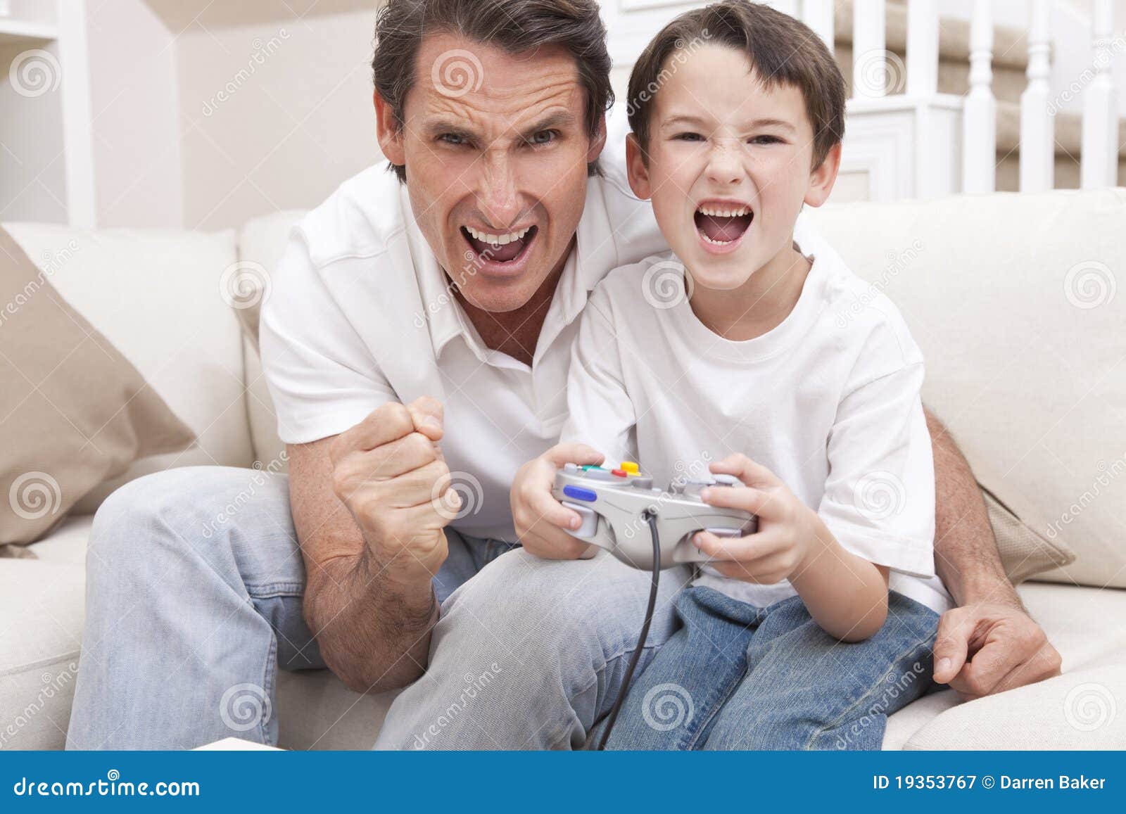 father and son playing video games