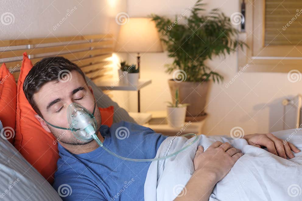 Man with Breathing Issues Using a Ventilator in Bed Stock Image Image