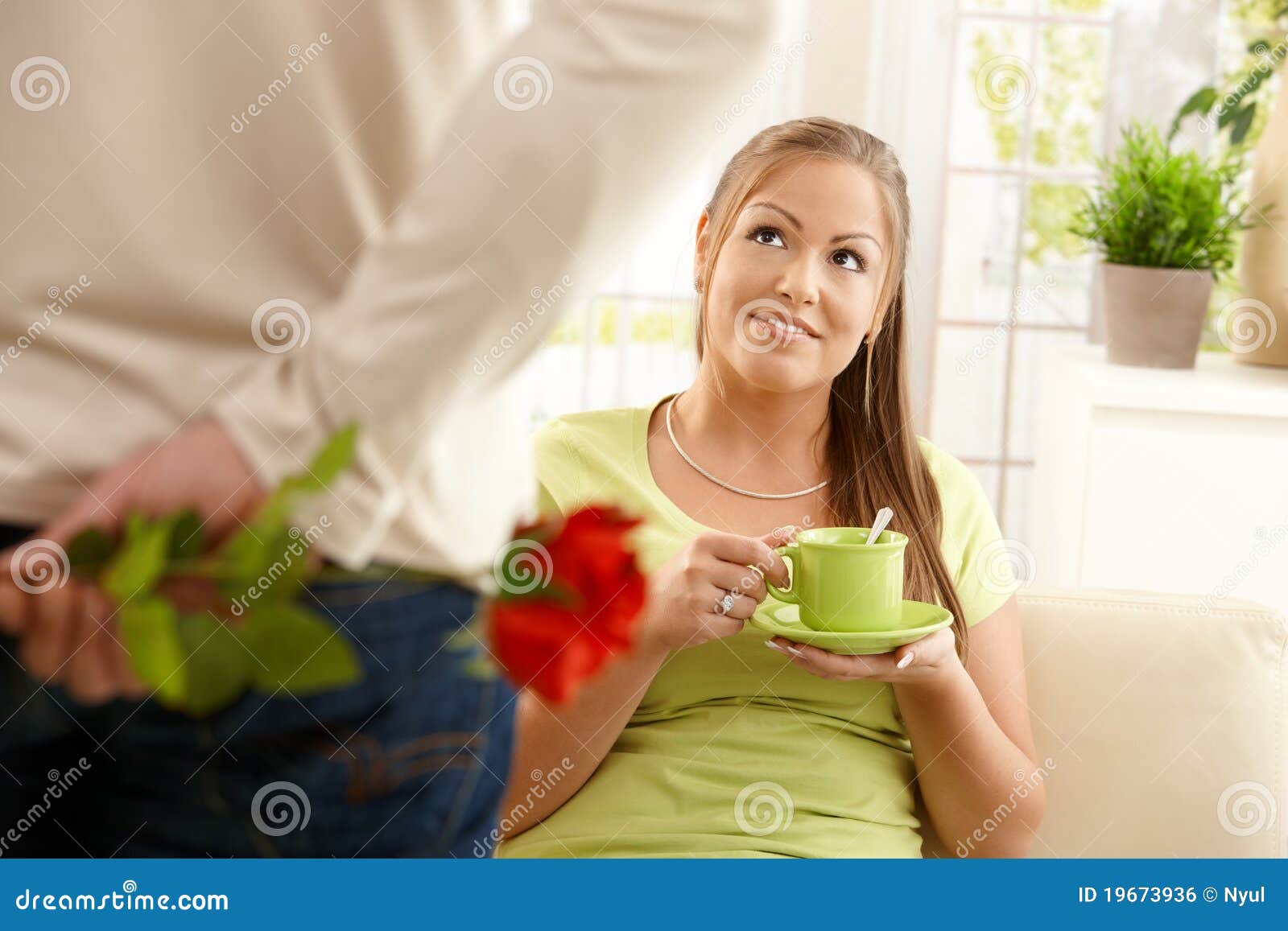 Man Bringing Flower To Woman Stock Photo Image of husband, horizontal