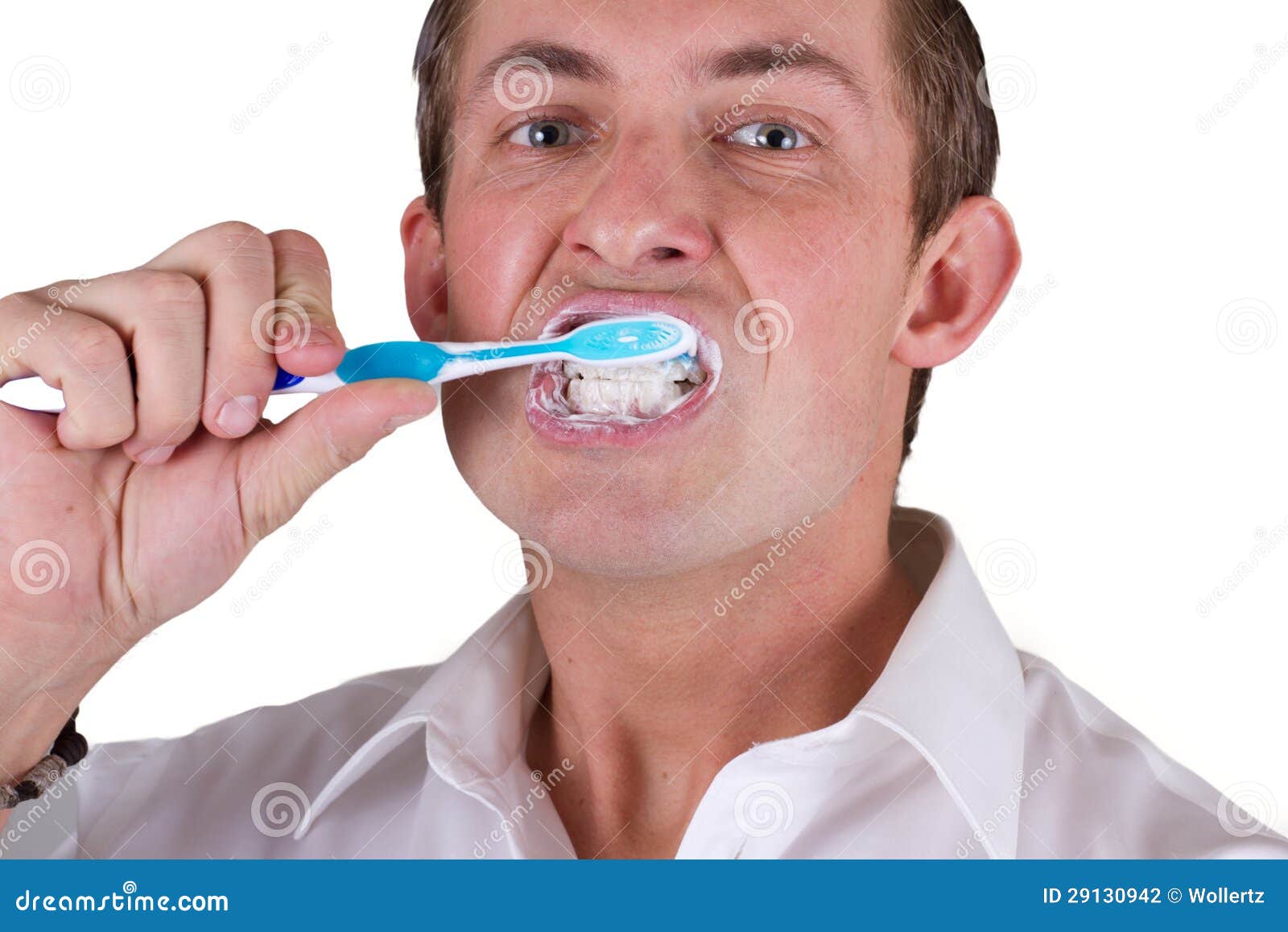 Man brushing his teeth stock photo. Image of grooming 29130942