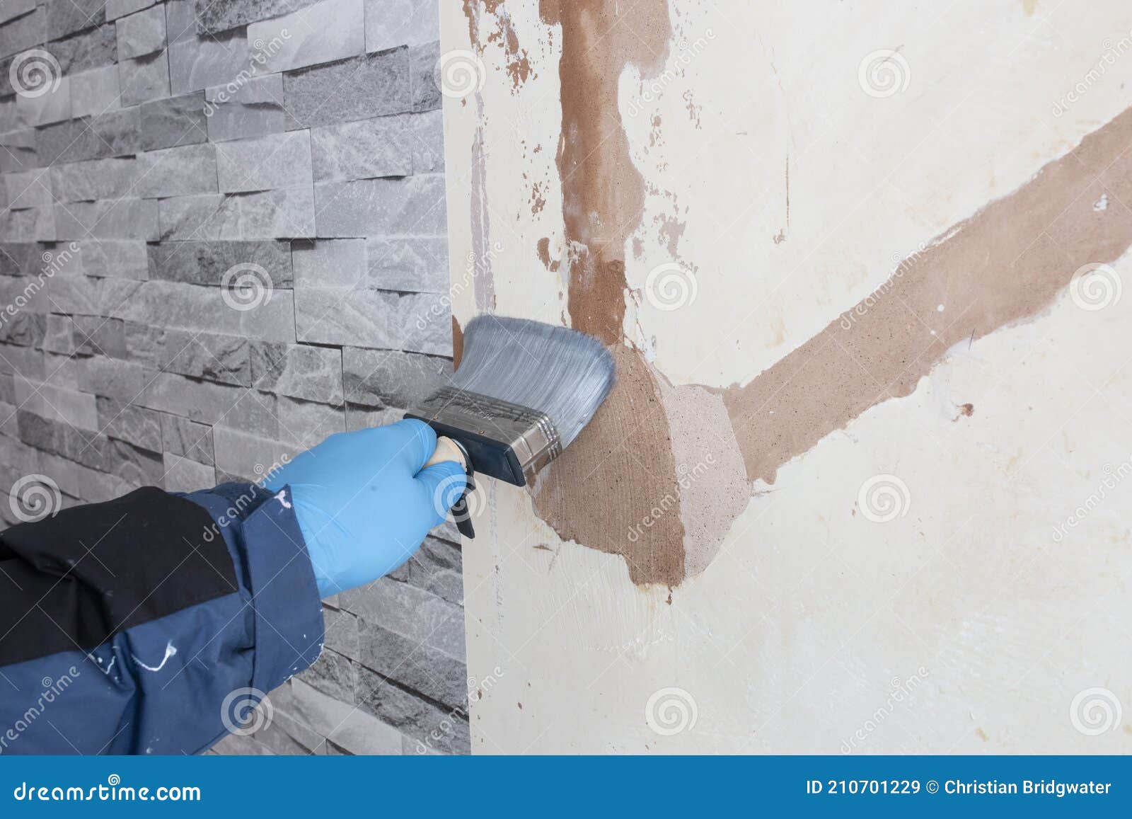 Man Brushing Wallpaper Paste Onto a Wall. Stock Image - Image of house, domestic: 210701229 Man Brushing Wallpaper Paste Onto a Wall. Stock Image - Image of house, domestic: 210701229