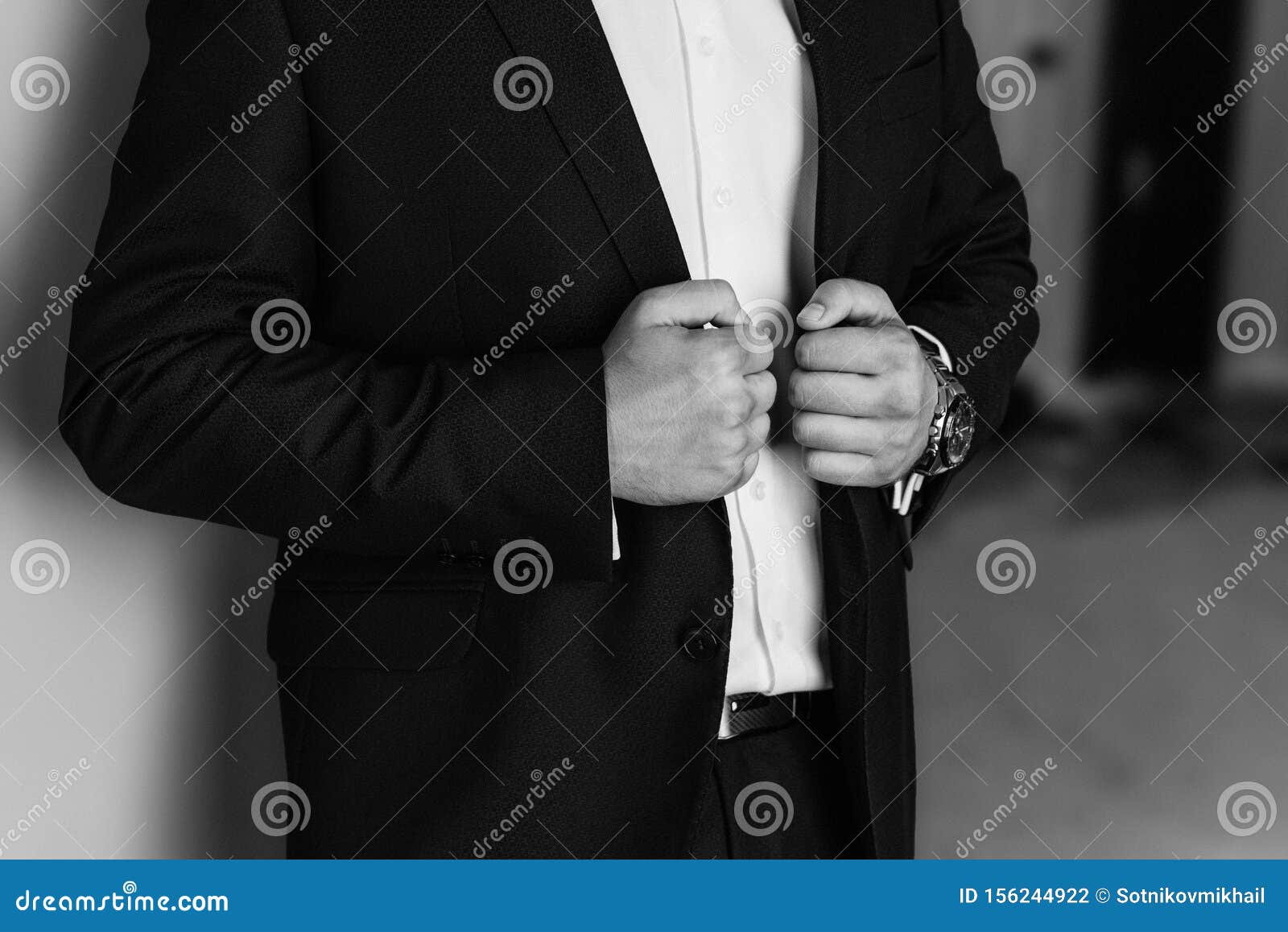 Man in Business Suit. a Man Puts on a Suit. Close-up Business Stylish ...