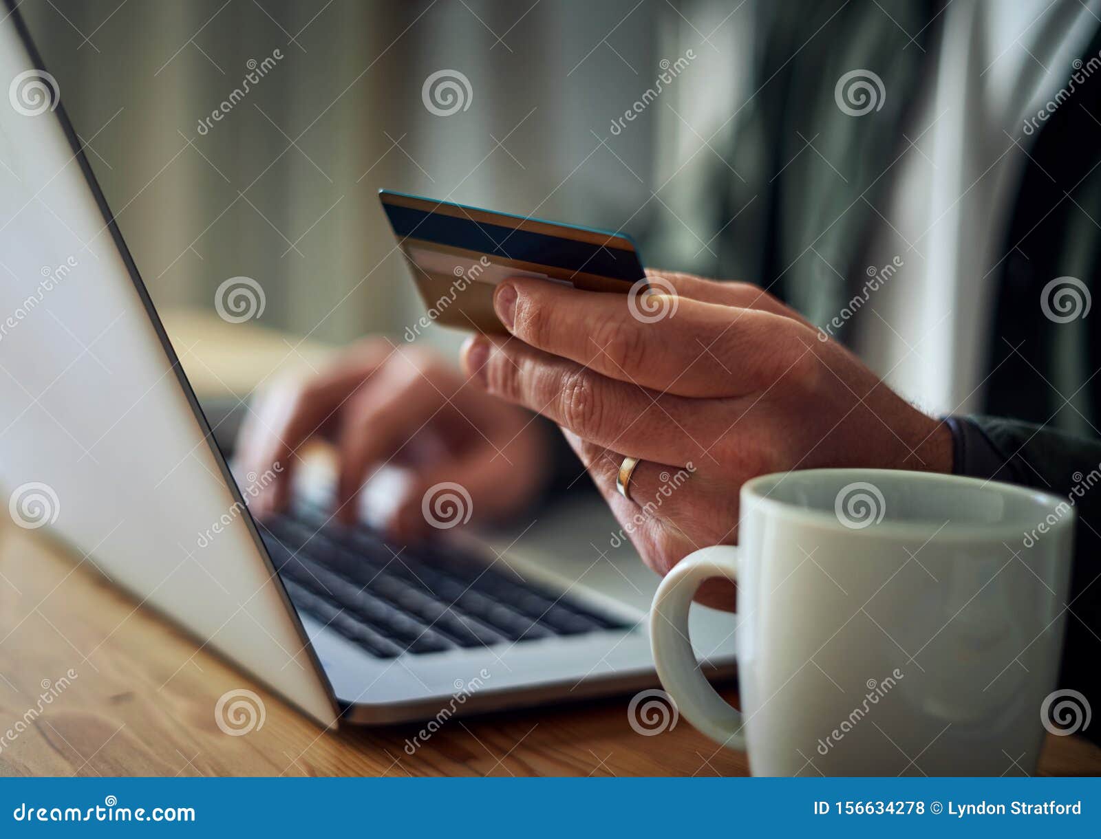Man Buying Online with a Credit Card Stock Photo Image of coffee