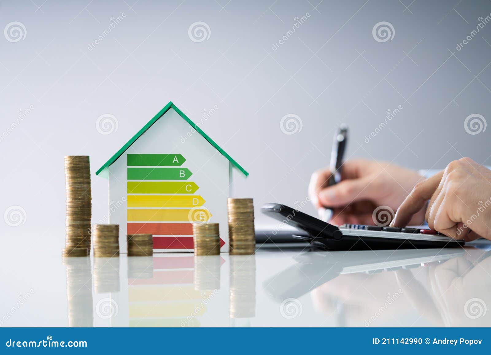 man calculating energy efficient house