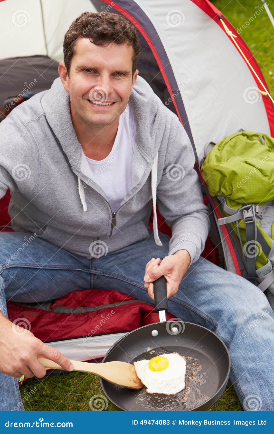 Man on Camping Holiday Frying Egg in Pan Stock Image Image of