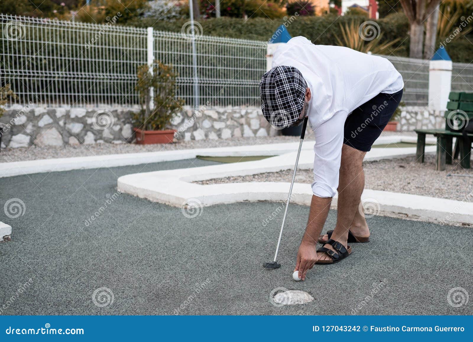 Man Putting the Golf Ball To Throw Stock Photo Image of elderly