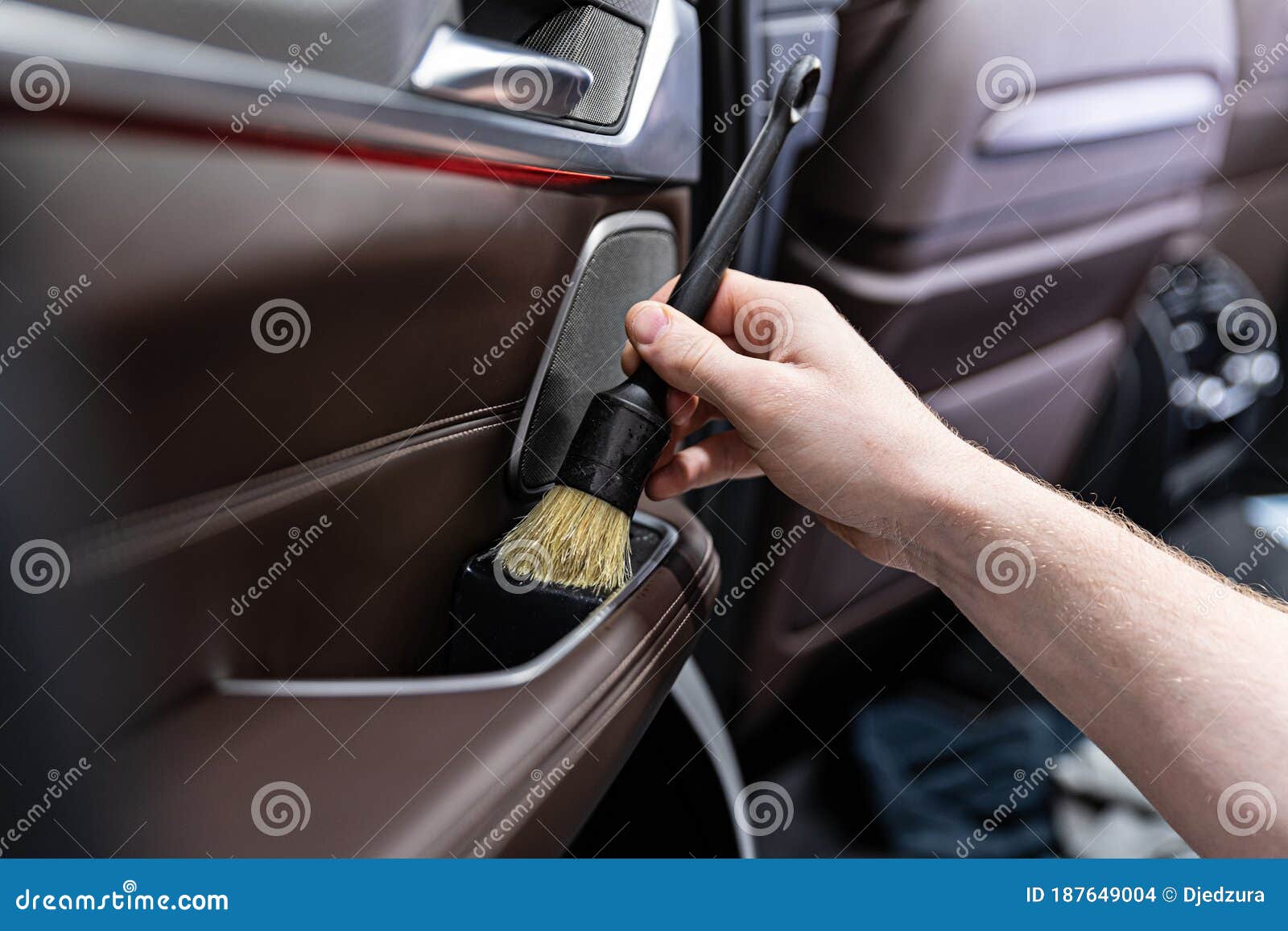 Man Car Detailing Studio Worker Cleaning Car Interior Stock Photo