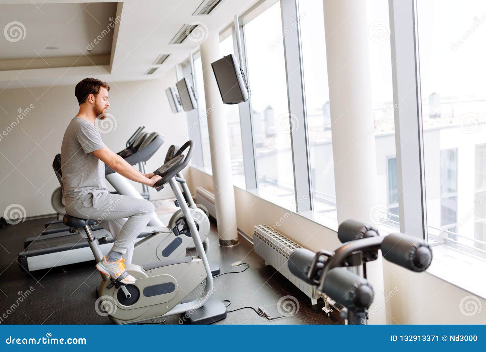 Man Cardio Training on a Bicycle Stock Image Image of caucasian