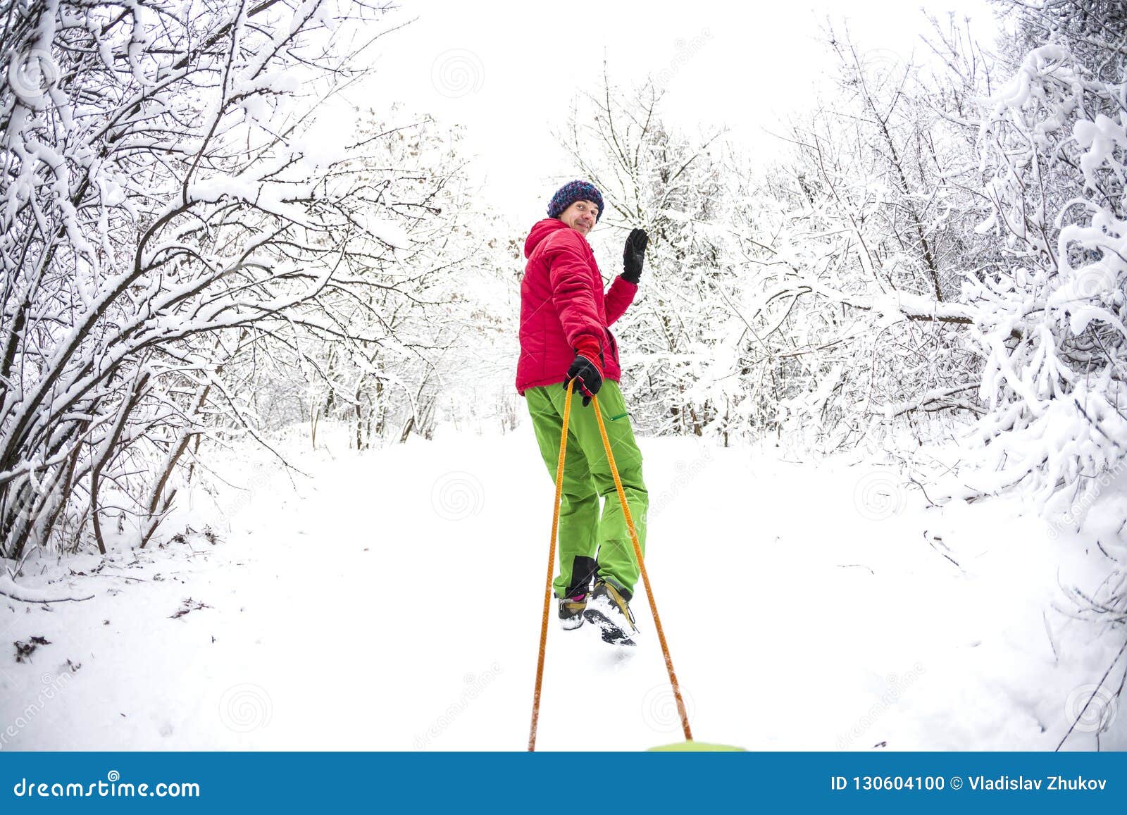 A Man Carries a Child on a Sled. Stock Photo - Image of active, leisure ...