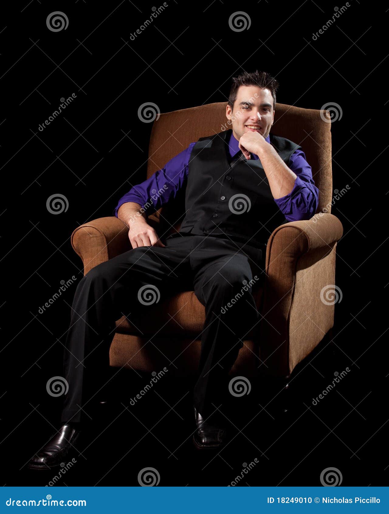 Man in Chair stock photo. Image of vest, studio, young 18249010