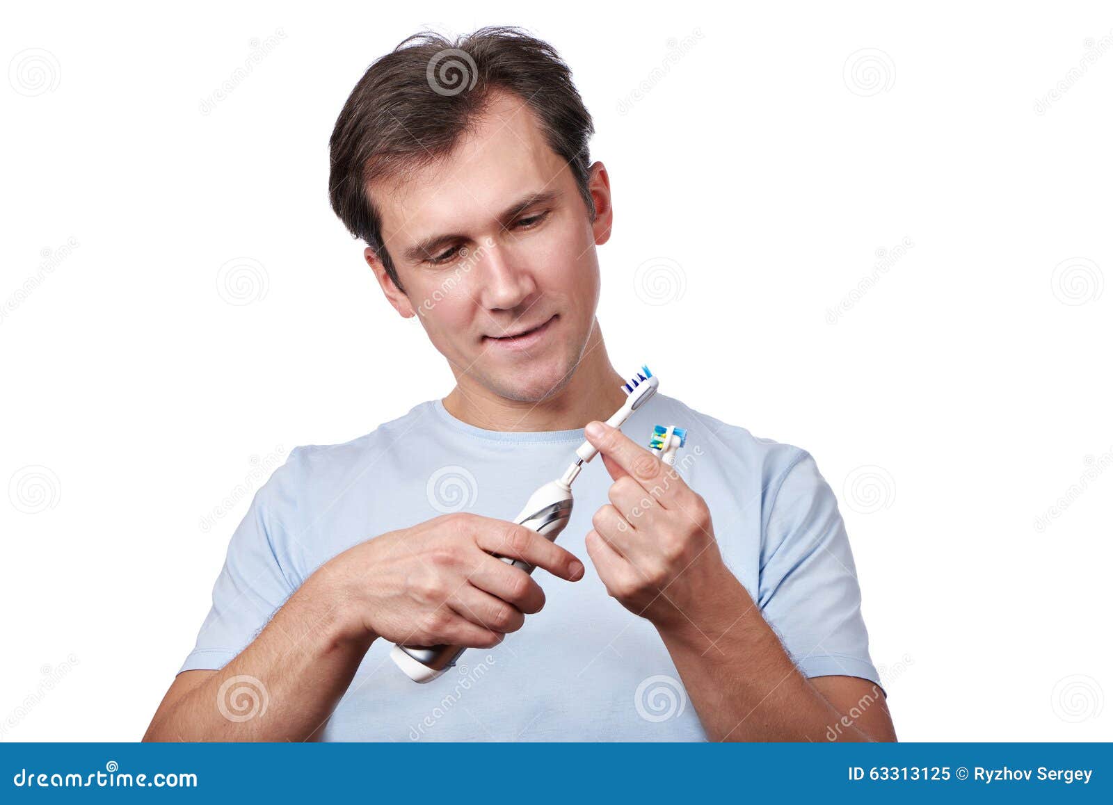 Man Changes Removable Heads for Electric Toothbrush Stock Image Image