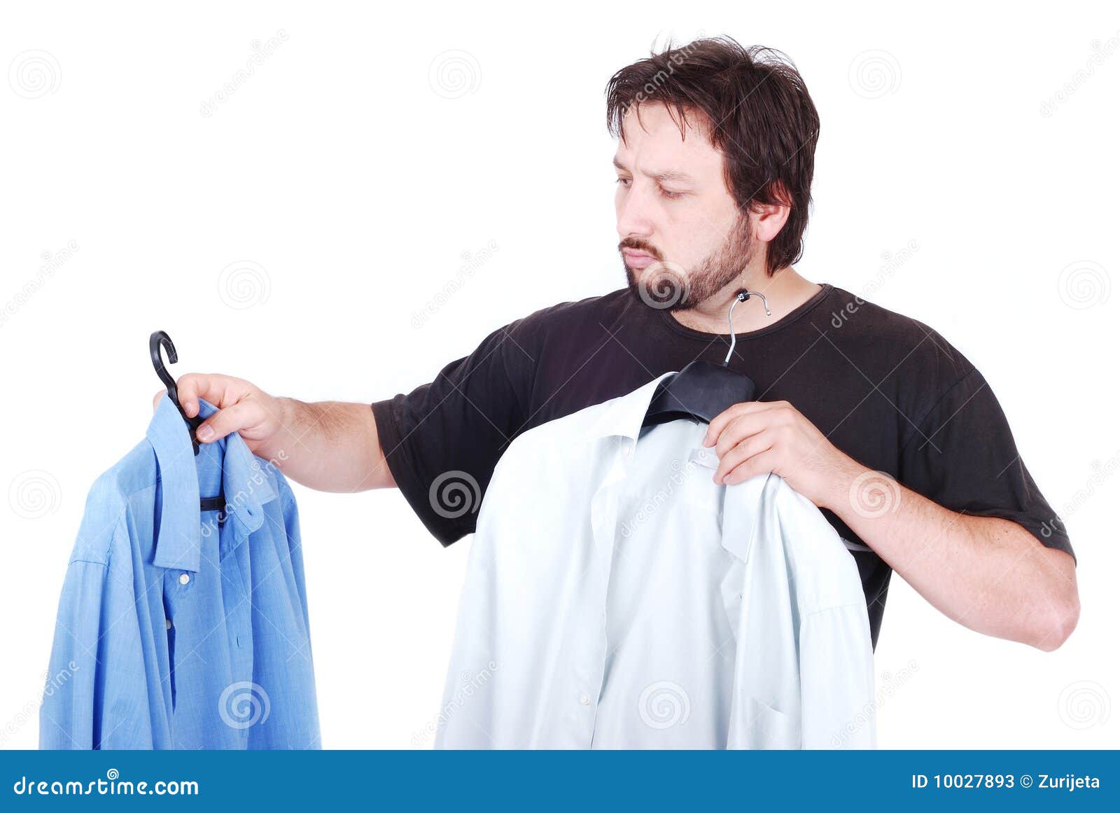 Man Choosing between Two Shirts Stock Image Image of isolated, hand 10027893