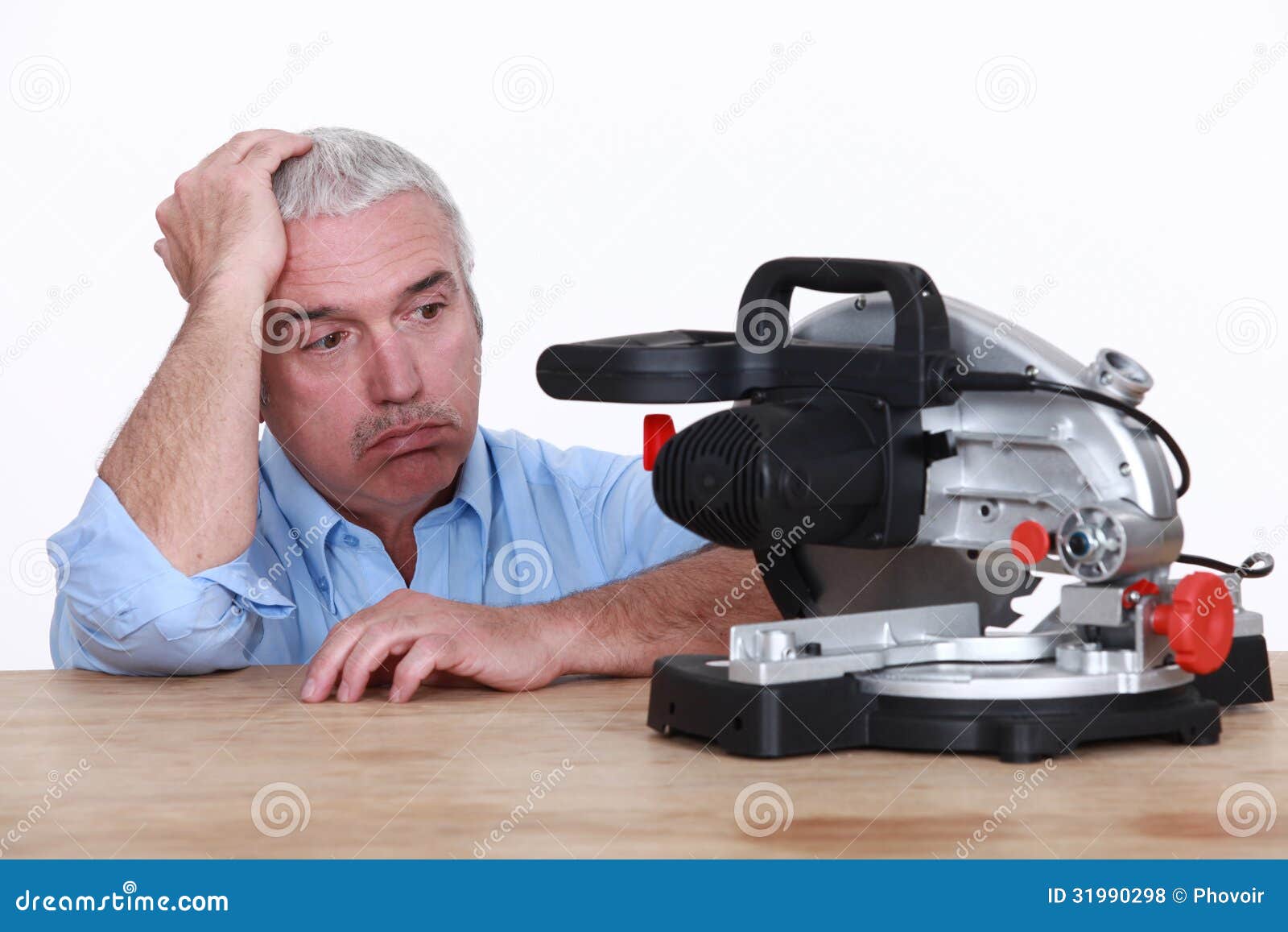 Man with circular saw stock photo. Image of table, metal 31990298