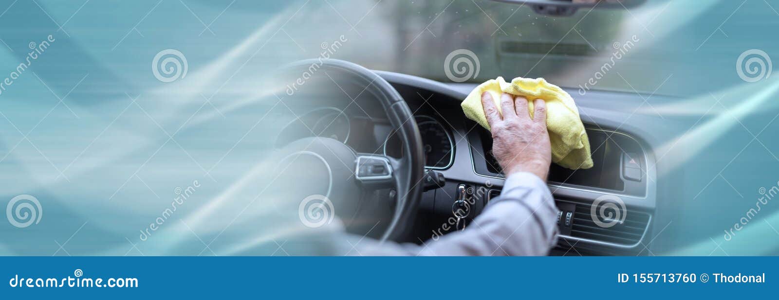 Man Cleaning a Car Dashboard; Panoramic Banner Stock Photo Image of