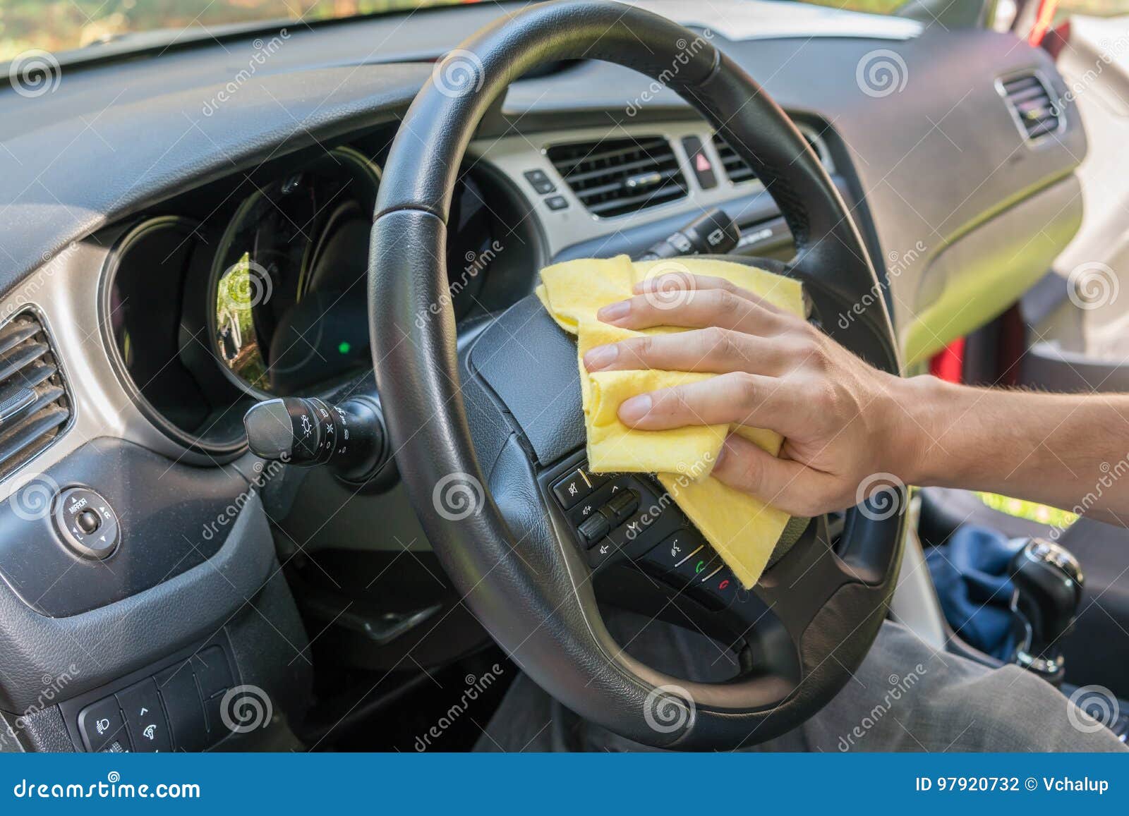 Man is Cleaning Car Interior with Microfiber Cloth Stock Photo Image
