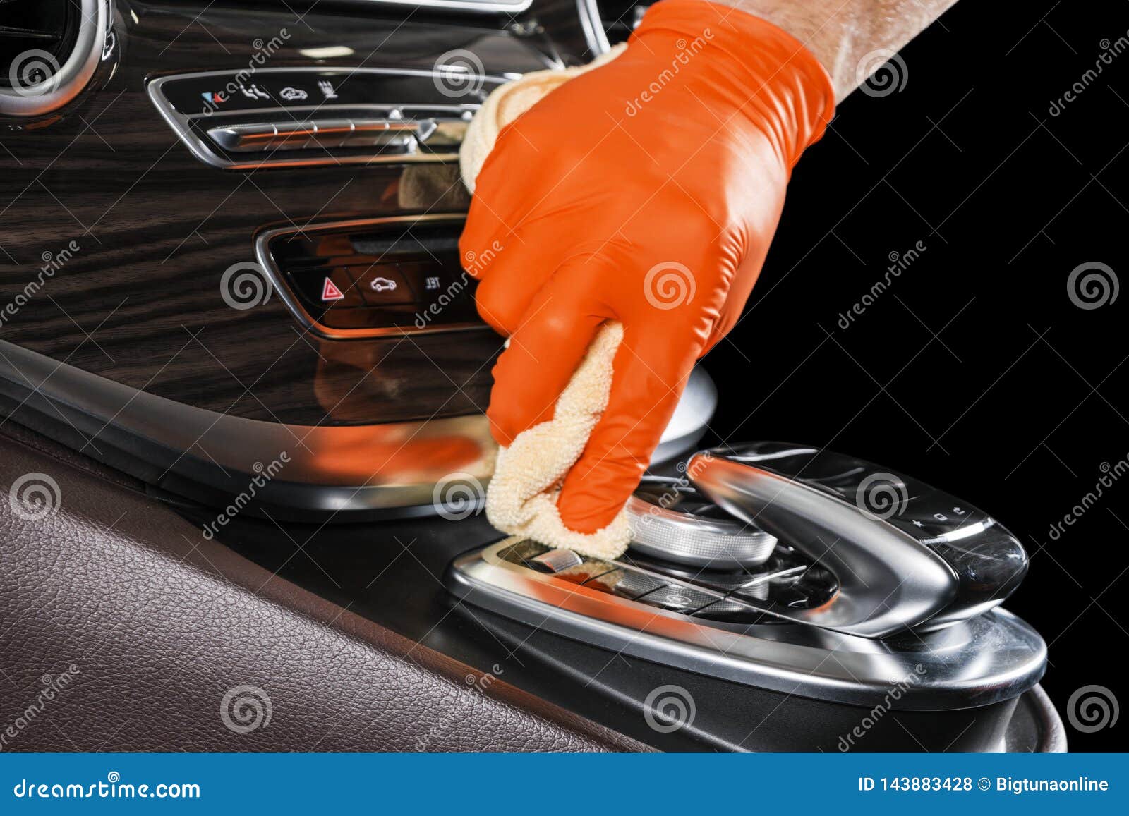 a man cleaning car with microfiber cloth. car detailing or valeting concept. selective focus. car detailing. cleaning with sponge.