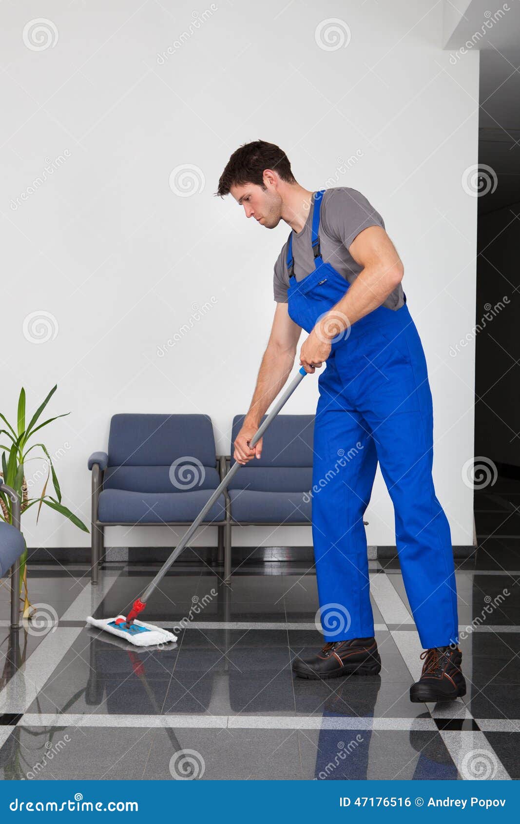 Man cleaning the floor stock photo. Image of cleaner 47176516