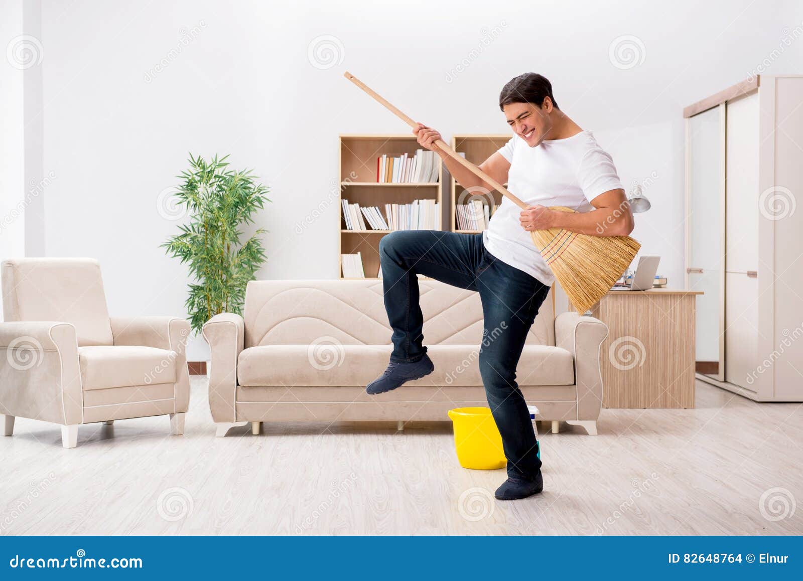 The Man Cleaning Home with Broom Stock Photo Image of domestic