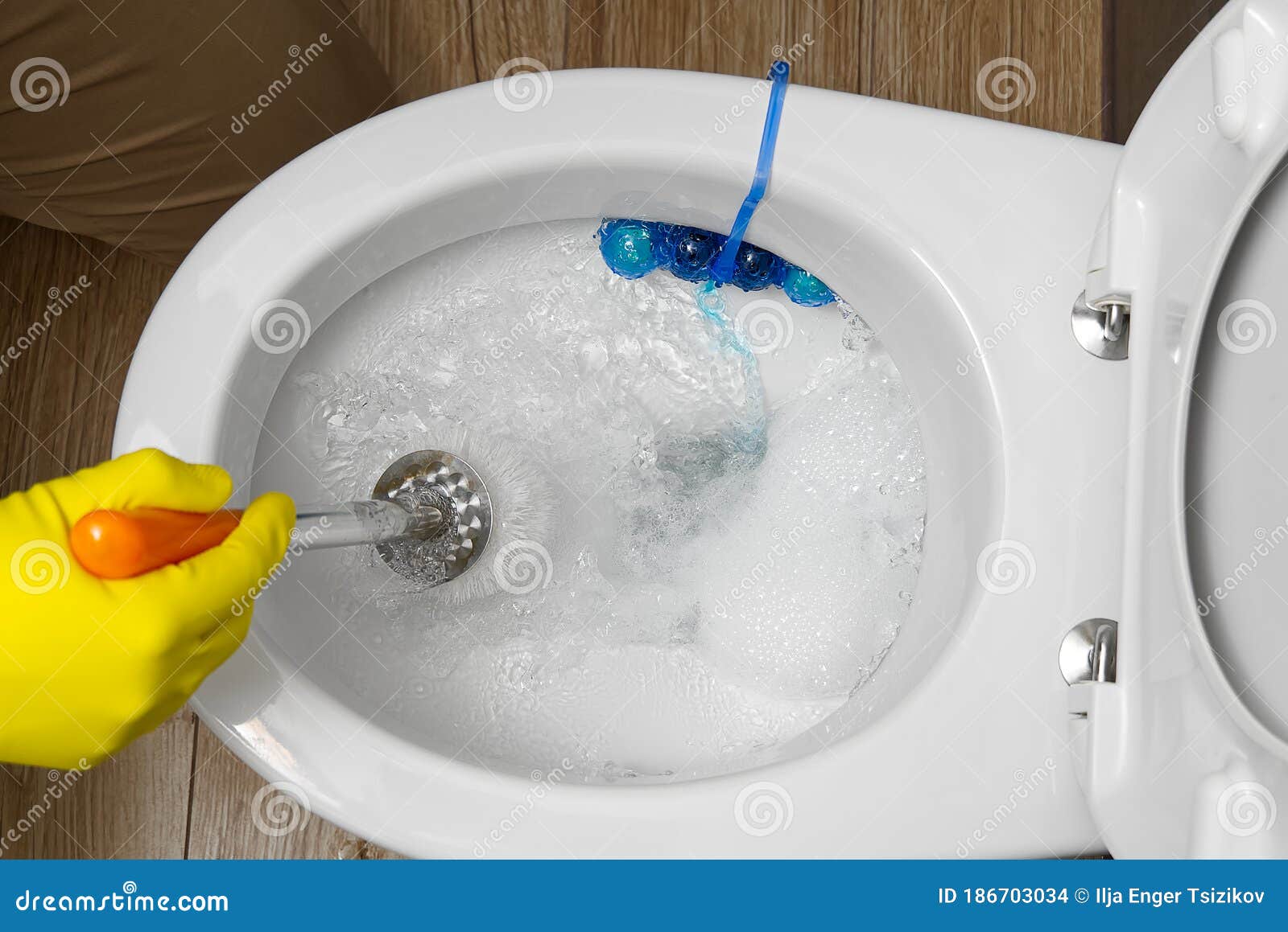 Plumber With A Toilet Plunger Stock Photo 66600082 
