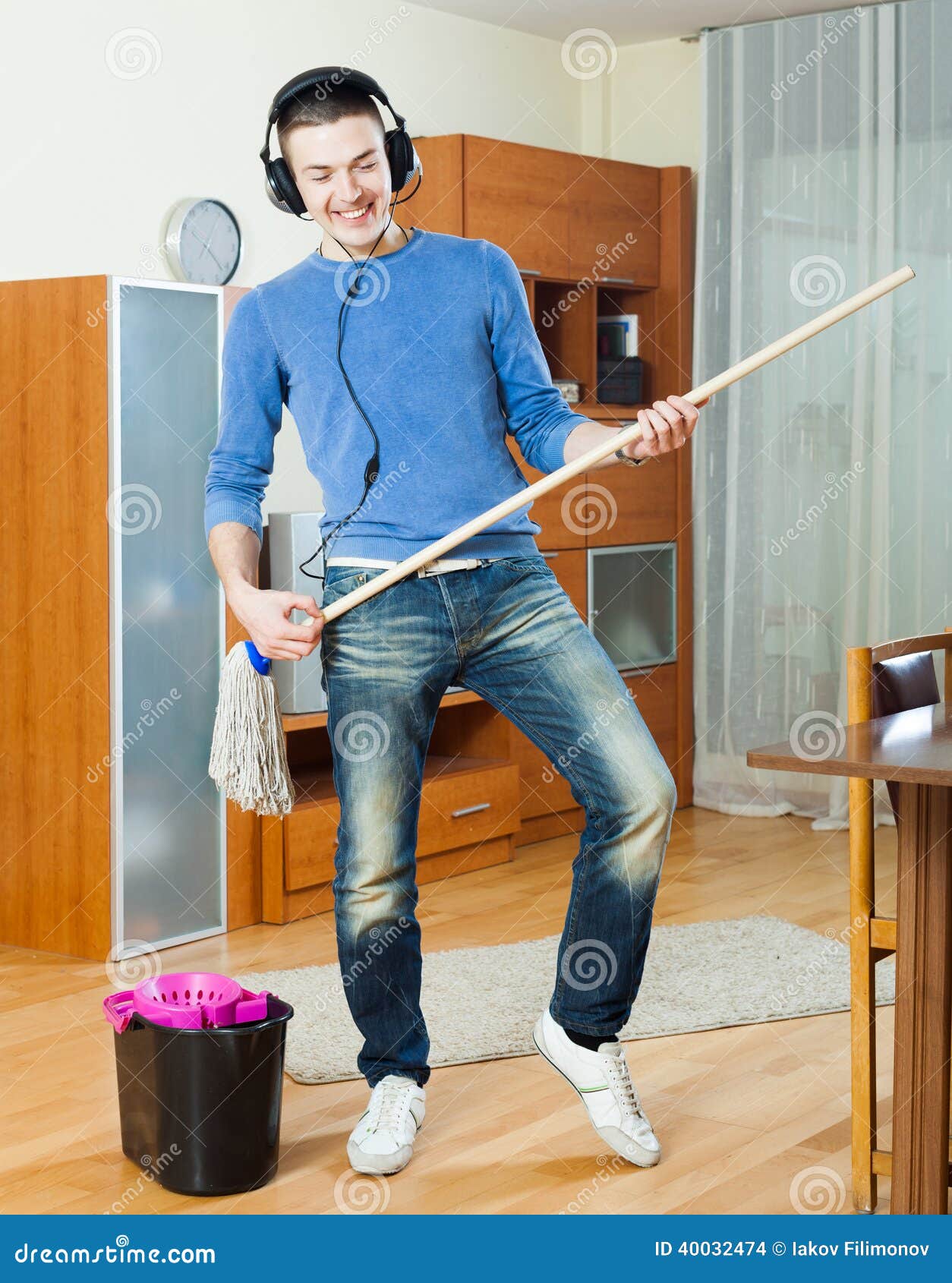 Man cleaning in room stock photo. Image of dusting, cleaner 40032474