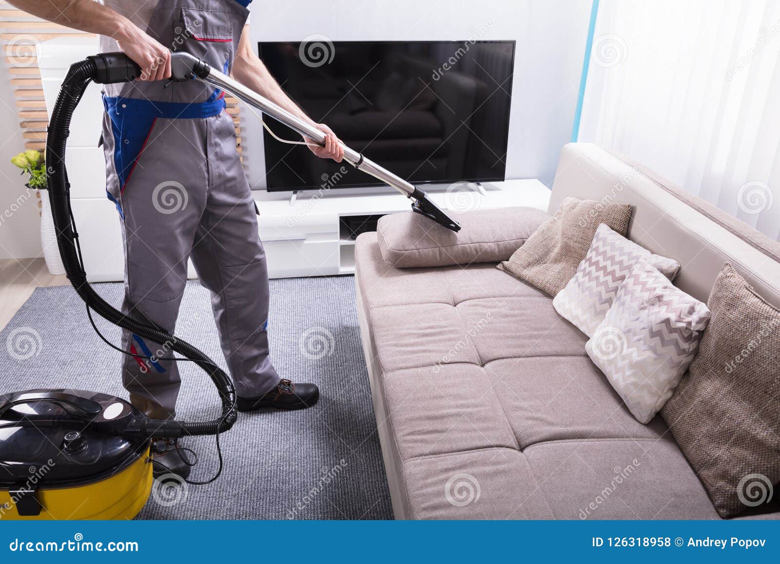 Person Cleaning Sofa With Vacuum Cleaner Stock Photo Image Of