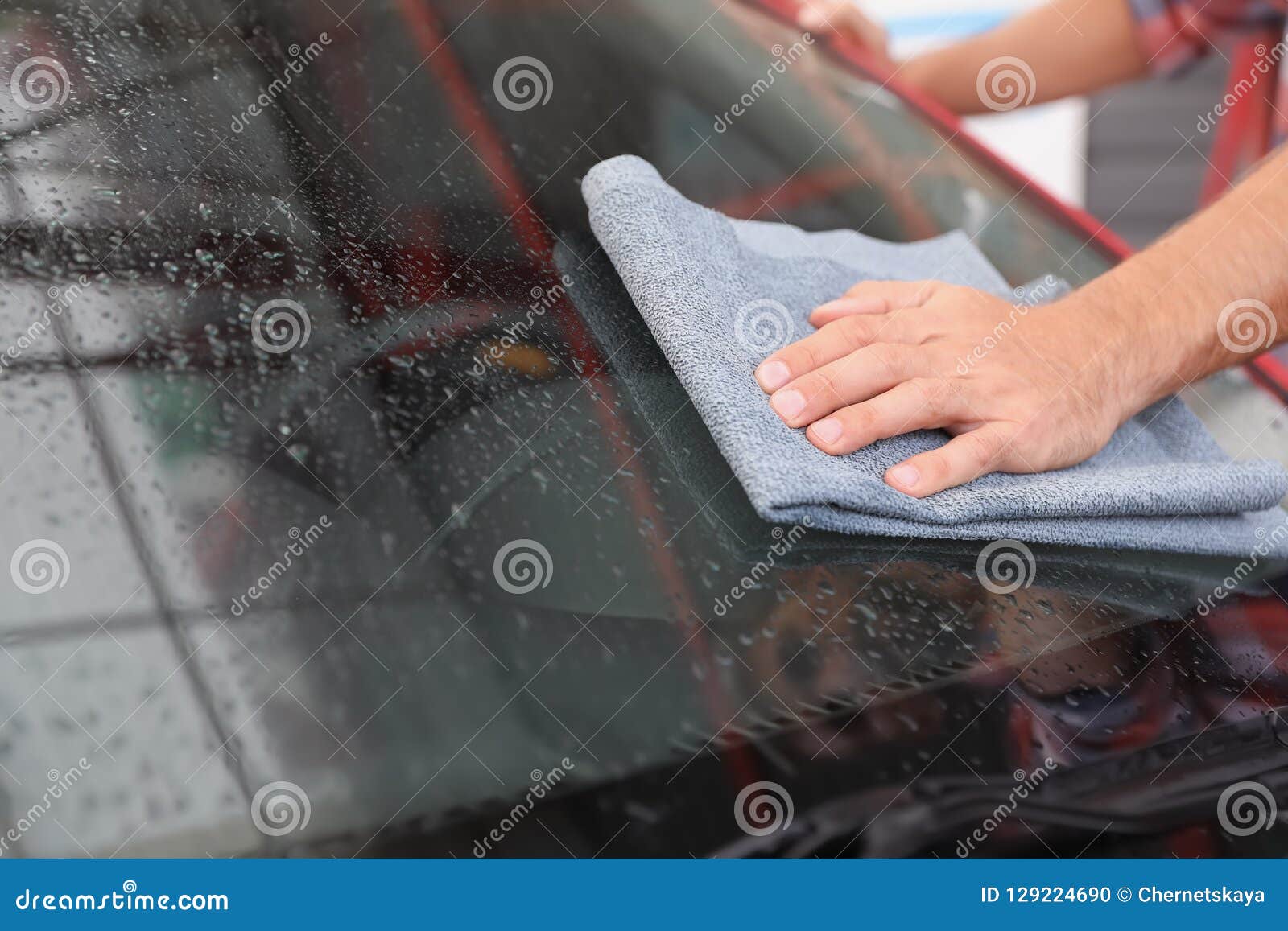 Man Cleaning Windshield with Duster, Closeup Stock Photo Image of